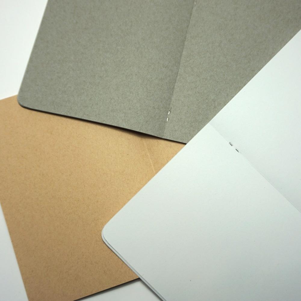 Three premium 140gsm sketchpads, one each of white, grey and sepia coloured cartridge papers