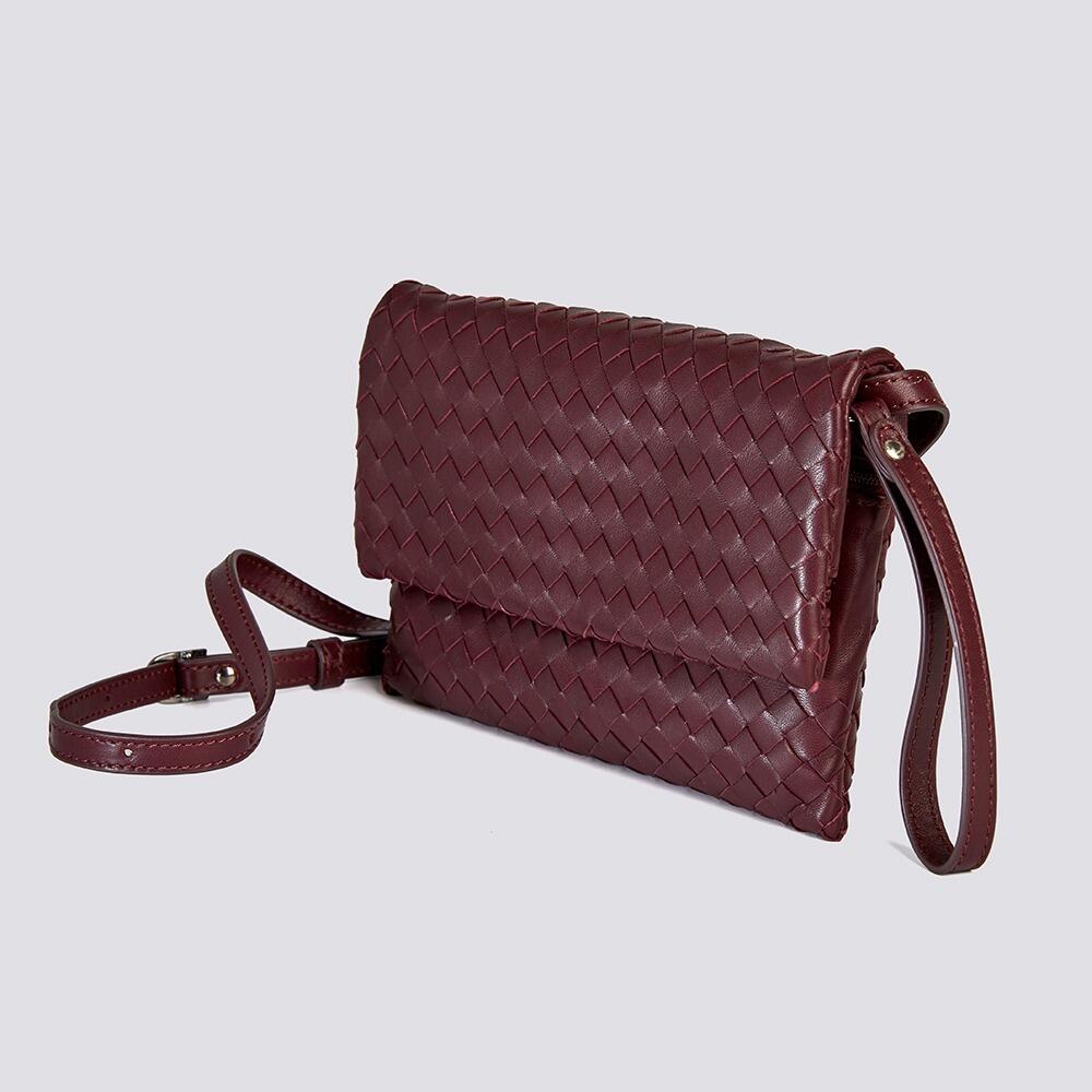 Exquisite burgundy leather mini intrecciato bag with strap, a symbol of sophistication.