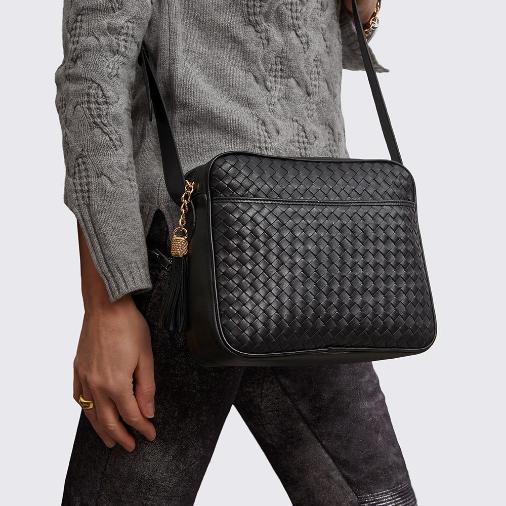 black crossbody handbag detail of intrecciato