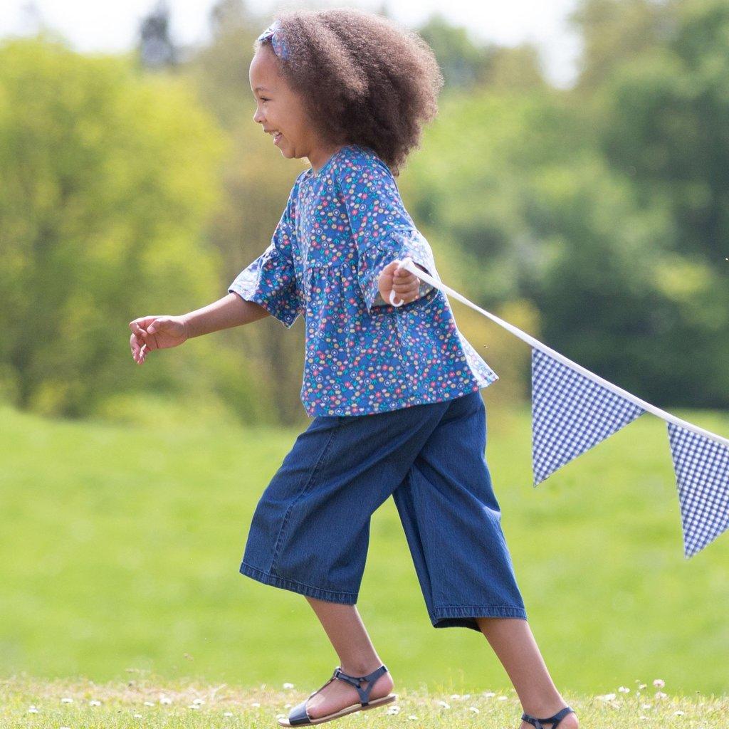 Girl running wearing Kite Clothing Denim Culottes