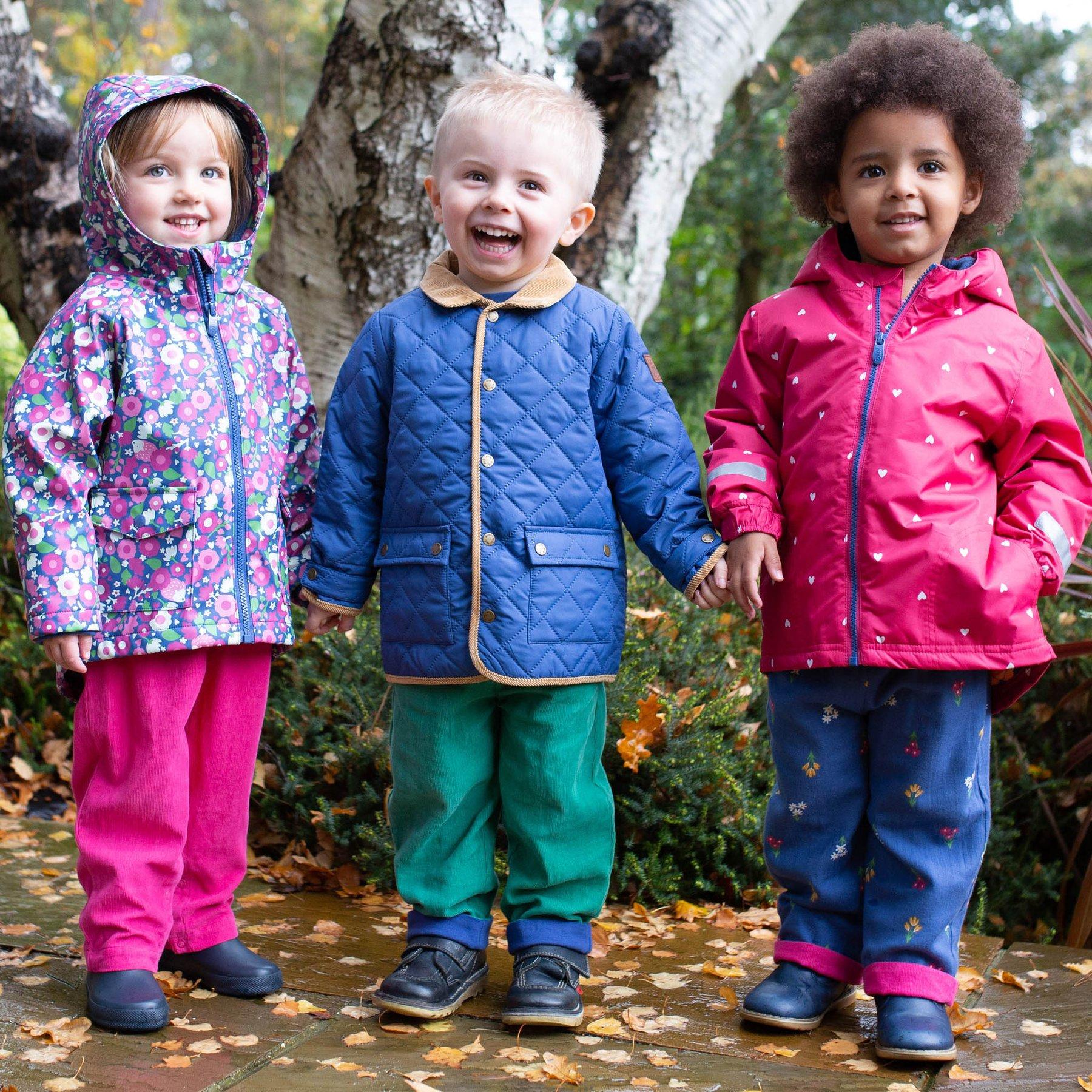 Girl wearing Kite Clothing Hedgerow Splash Coat with friends