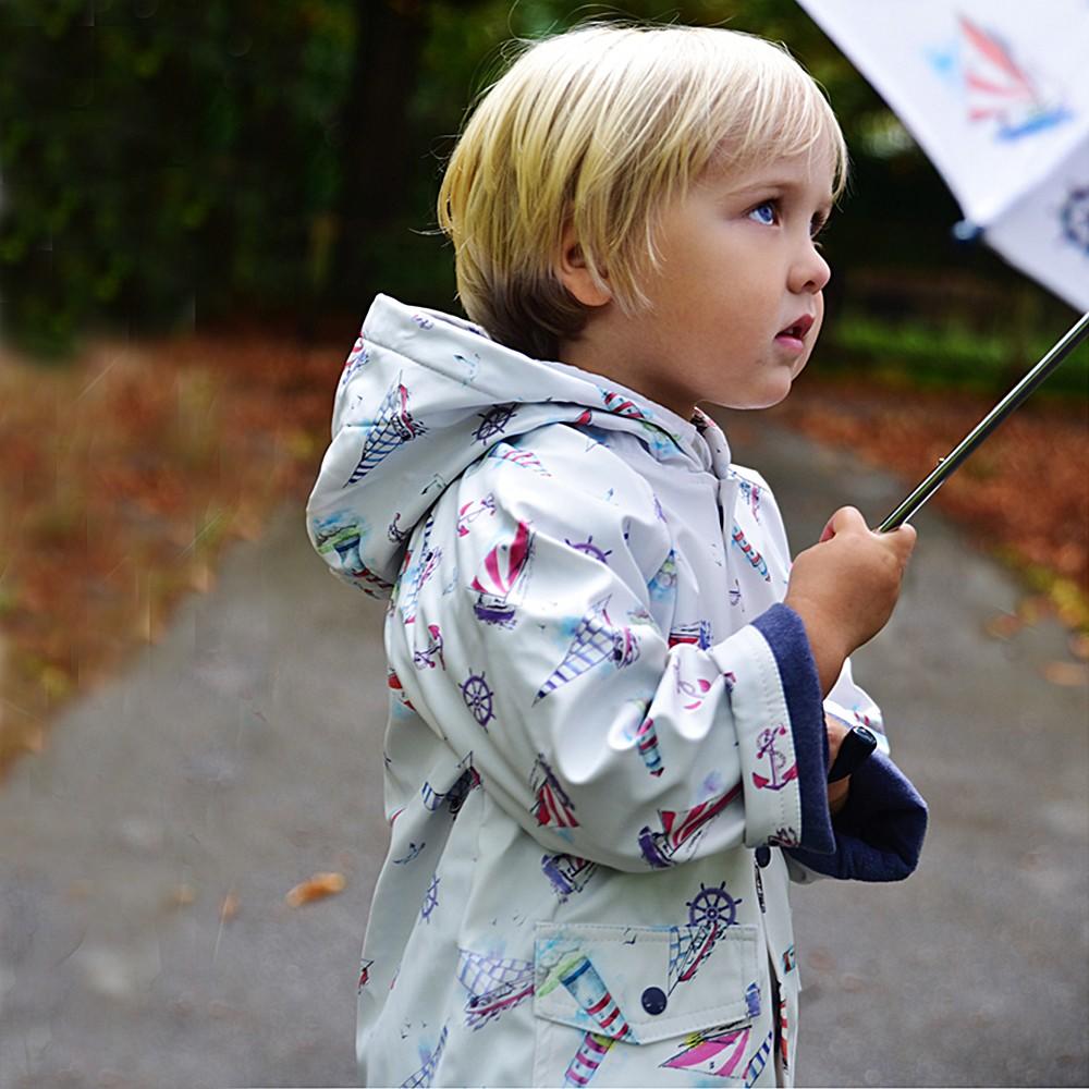 Boy Wearing Powell Craft Nautical Rain Mac Side