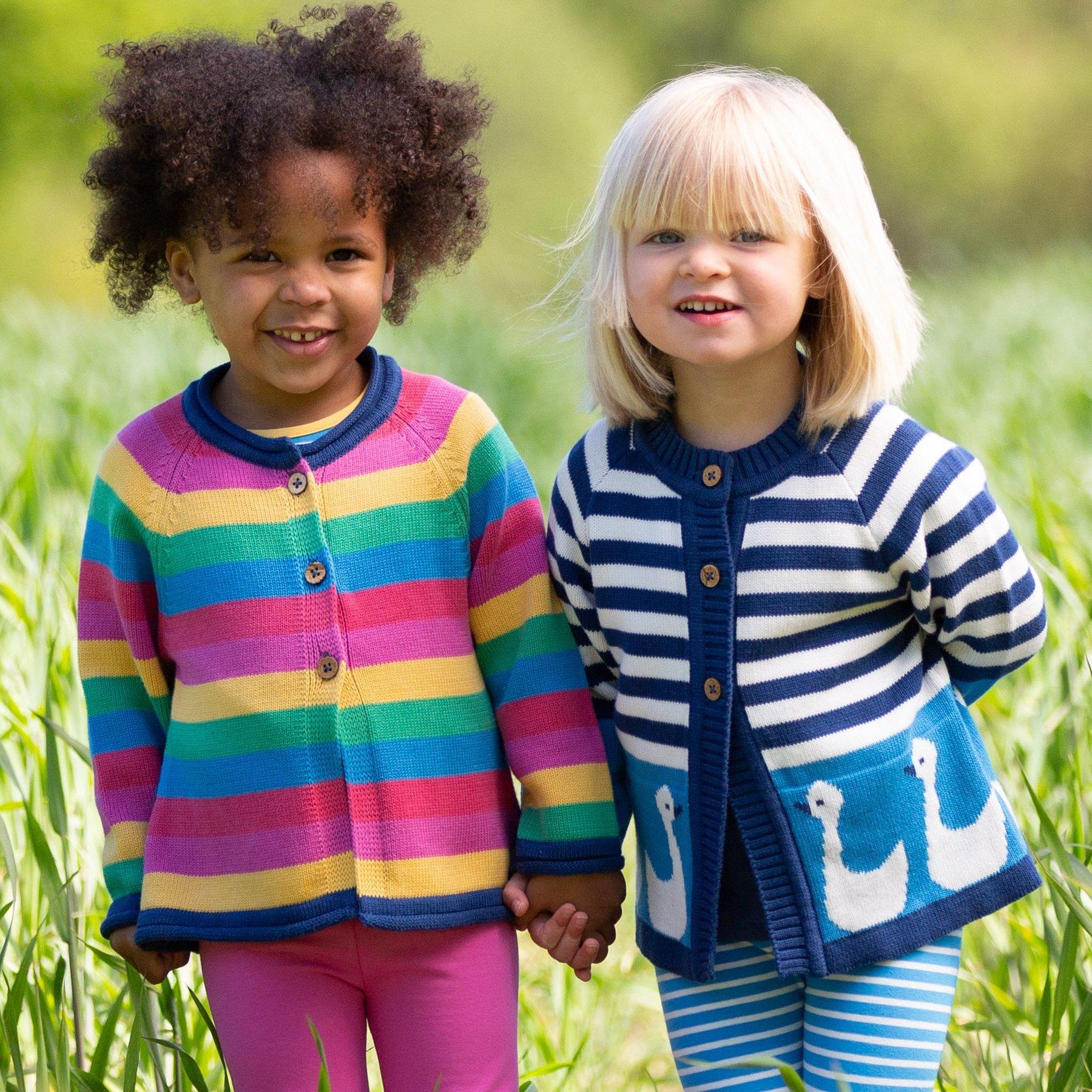 Girl wearing Kite Clothing Rainbow Cardi with friend