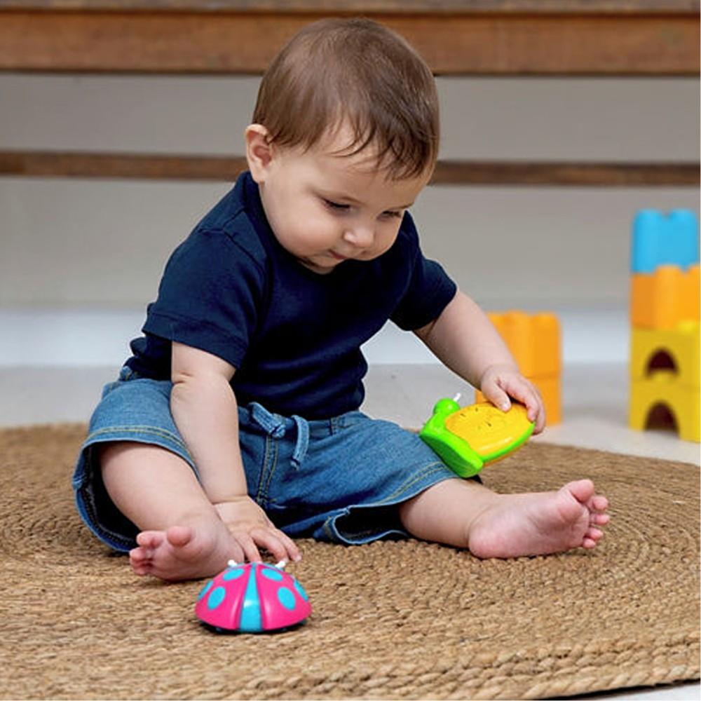 Boy Playing With Hallit Toys Spot Ladybird Shaker
