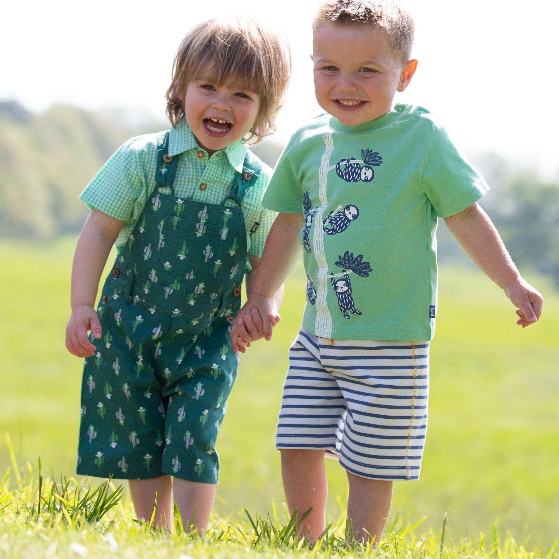 Boy wearing Kite Clothing Cowboy Cactus Dungarees with friend