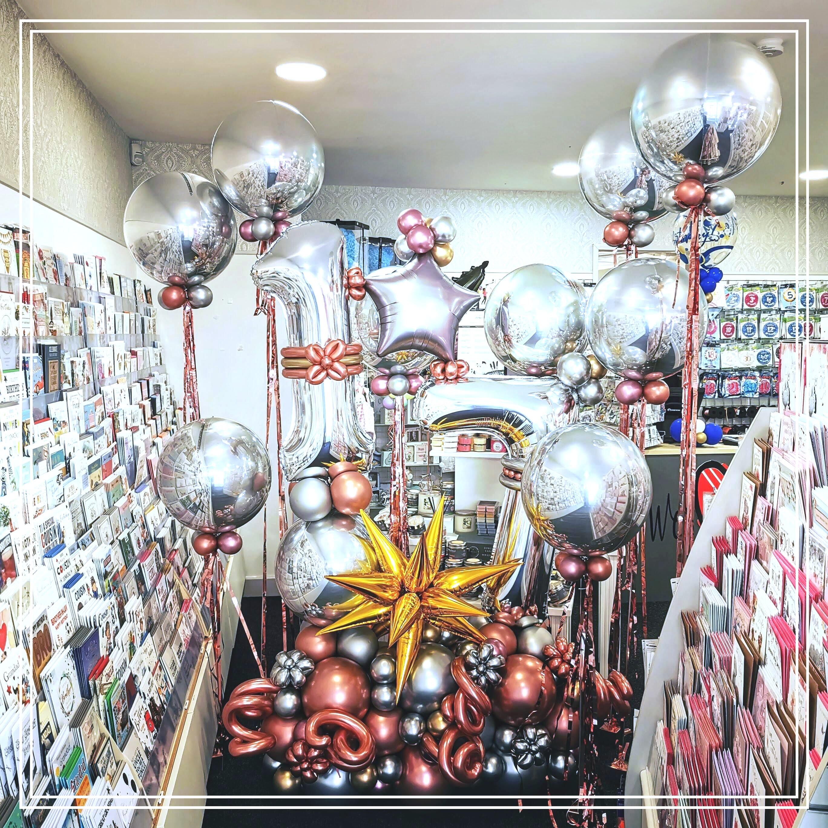 Massive Balloon Display for a 17 year old in Chrome Balloons Ready to goto a party