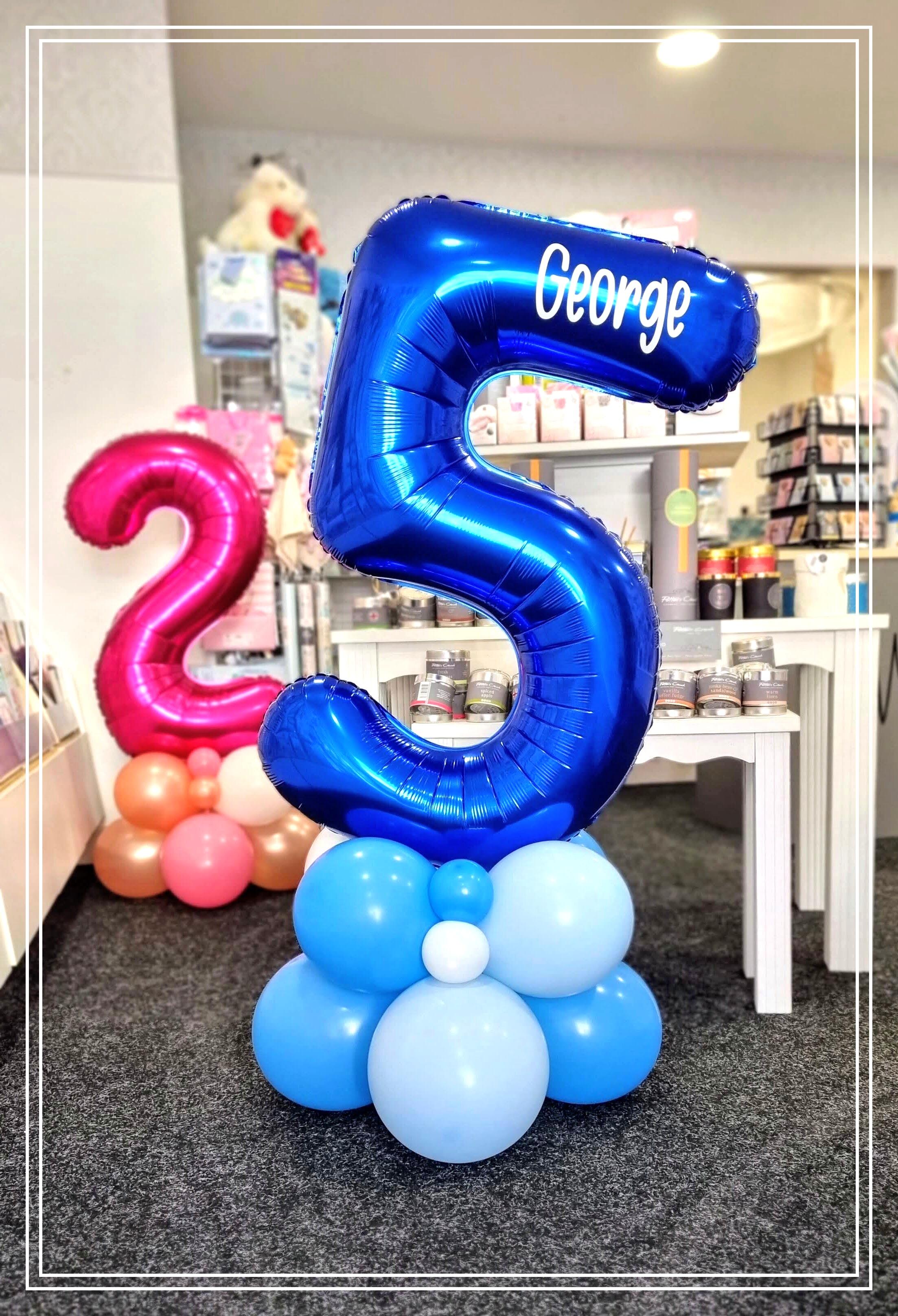 Personalised Balloon Number in Dark Blue on a base of latex balloons