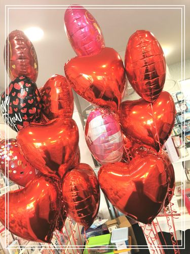 Bunch of Helium Filled Hearts