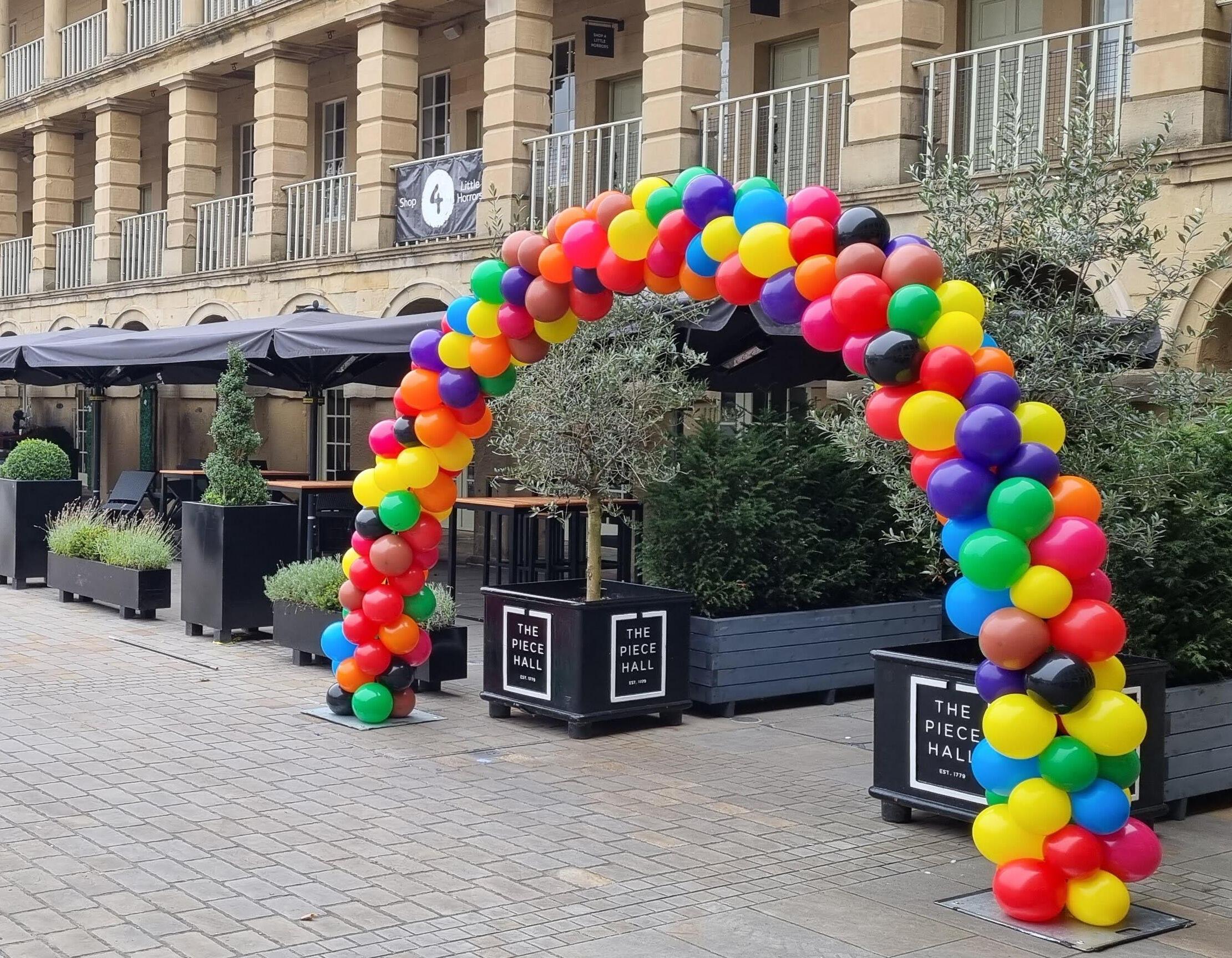 Balloon Arch in Bright Colours at The Piece Hall Halifax to celebrate Pride