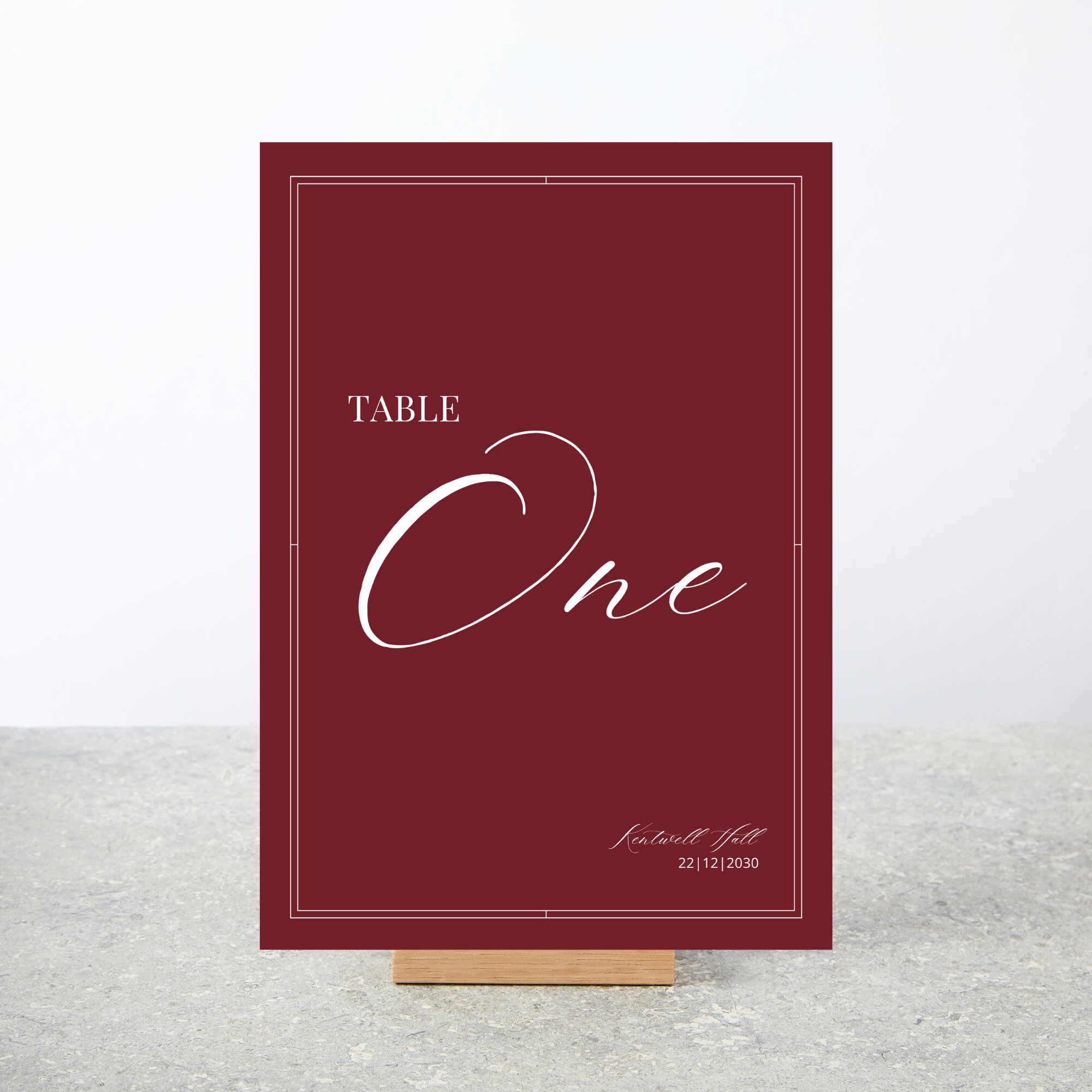 modern burgundy [deep wine shade, claret, ox blood] personalised wedding table numbers with white fonts and white border. Couples names, dates and all guest names are editable.