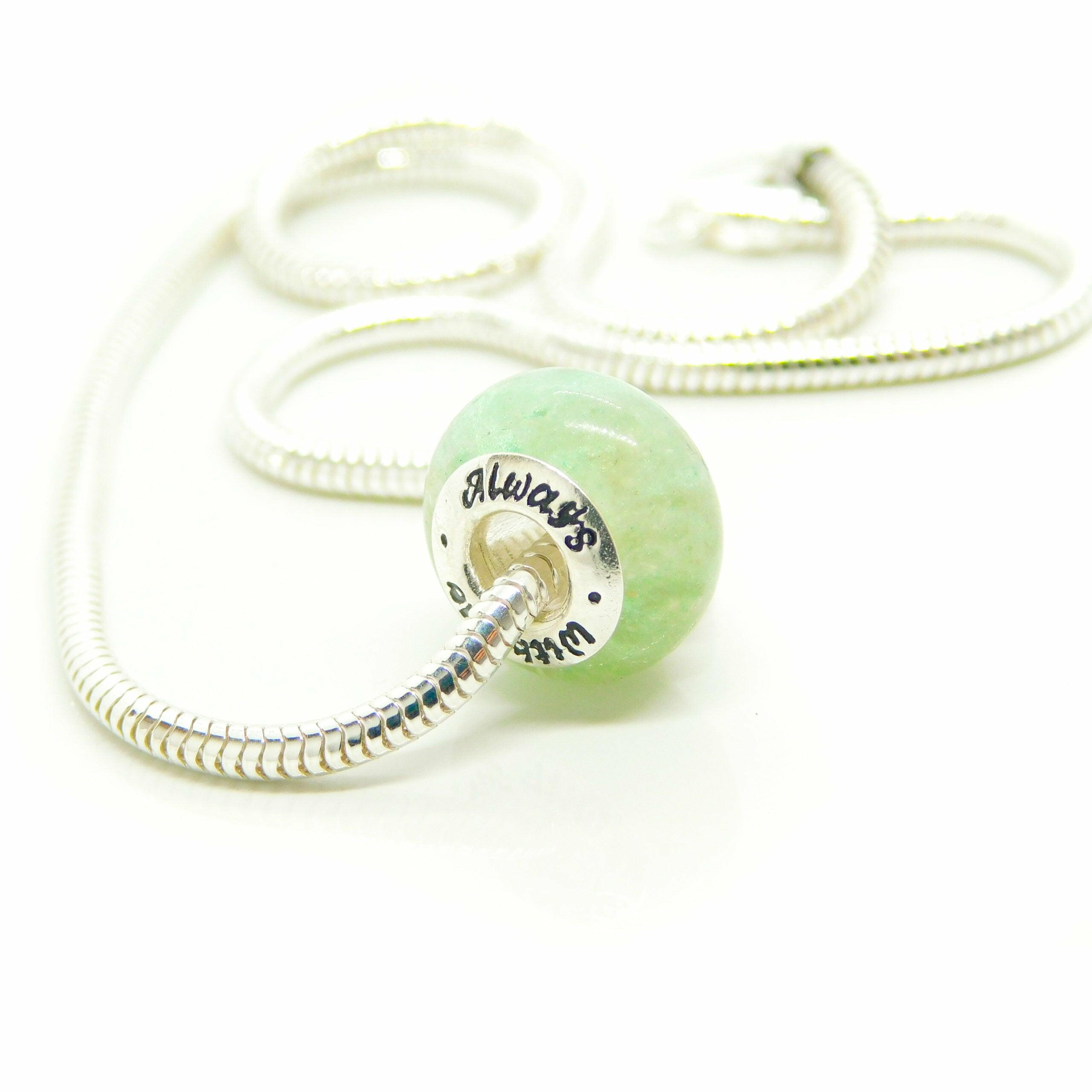 Circular Bead on Silver Snake Style Bracelet (Bracelet only for effect)with Silver Insert that fits Modern Style Bracelet's. Contains Cremation Ashes