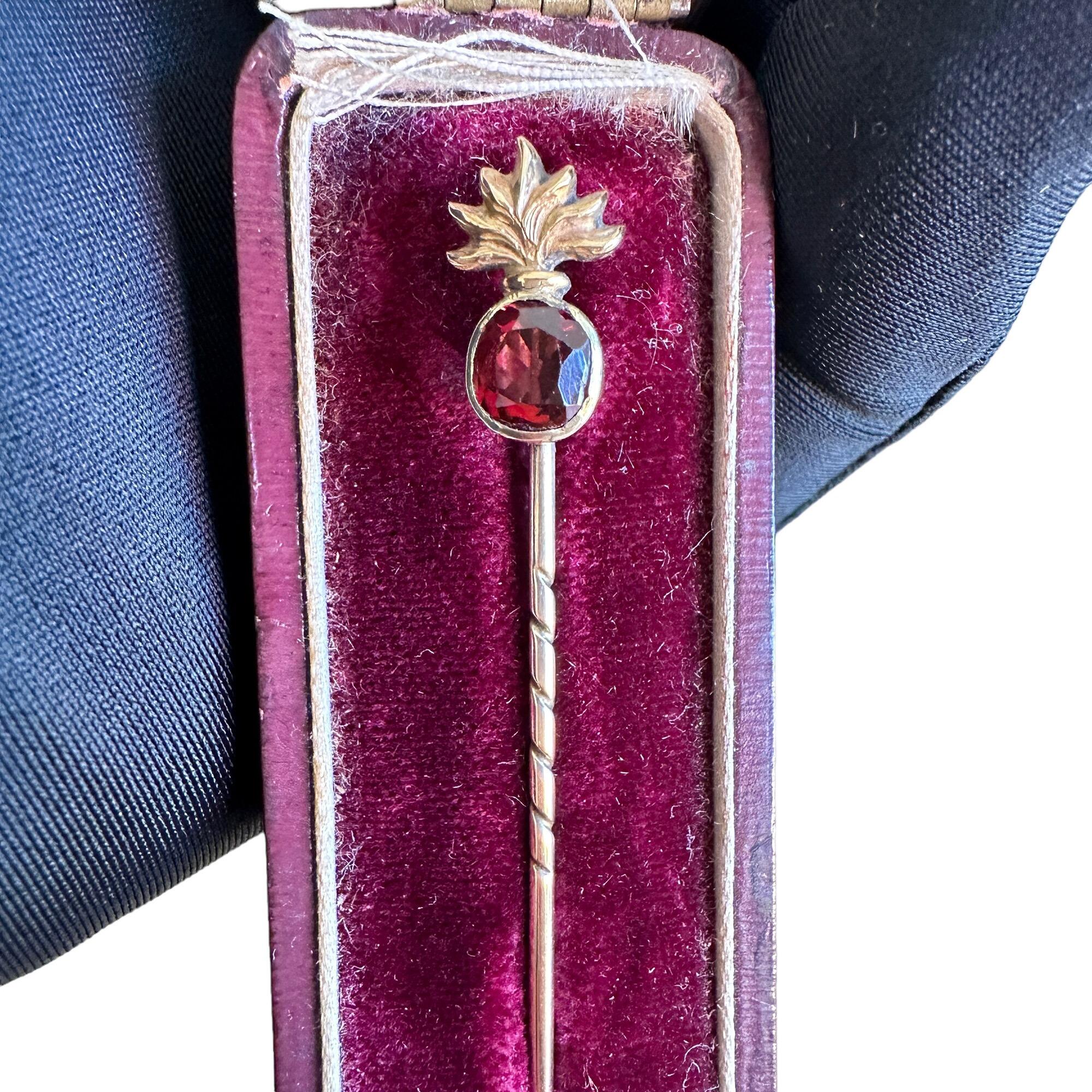 Edwardian, Royal Fusiliers, 15ct gold hessonite garnet stickpin