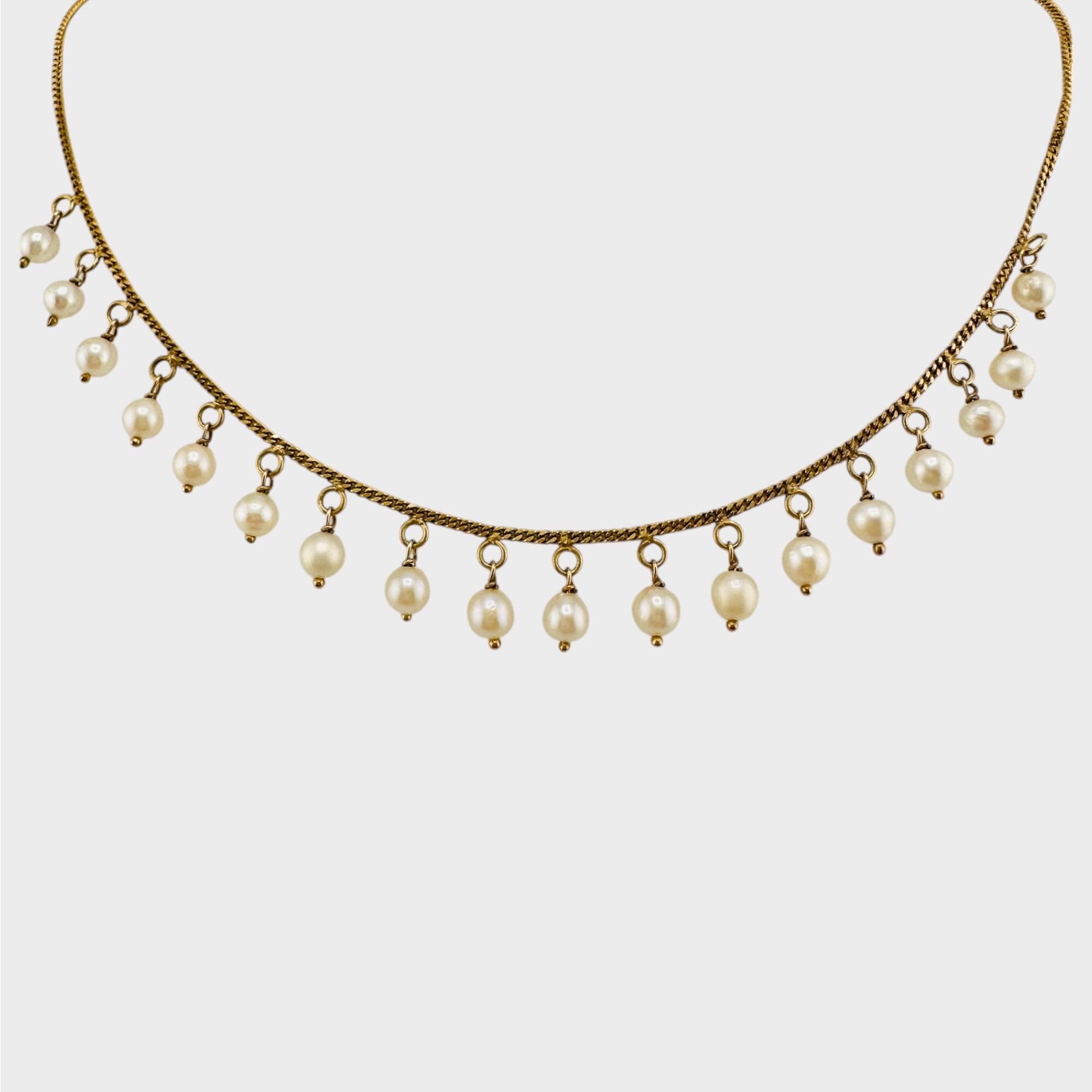 Vintage Cultured Pearl and 9ct Yellow Gold Fringe Necklace on jewellery display bust, facing forward.
