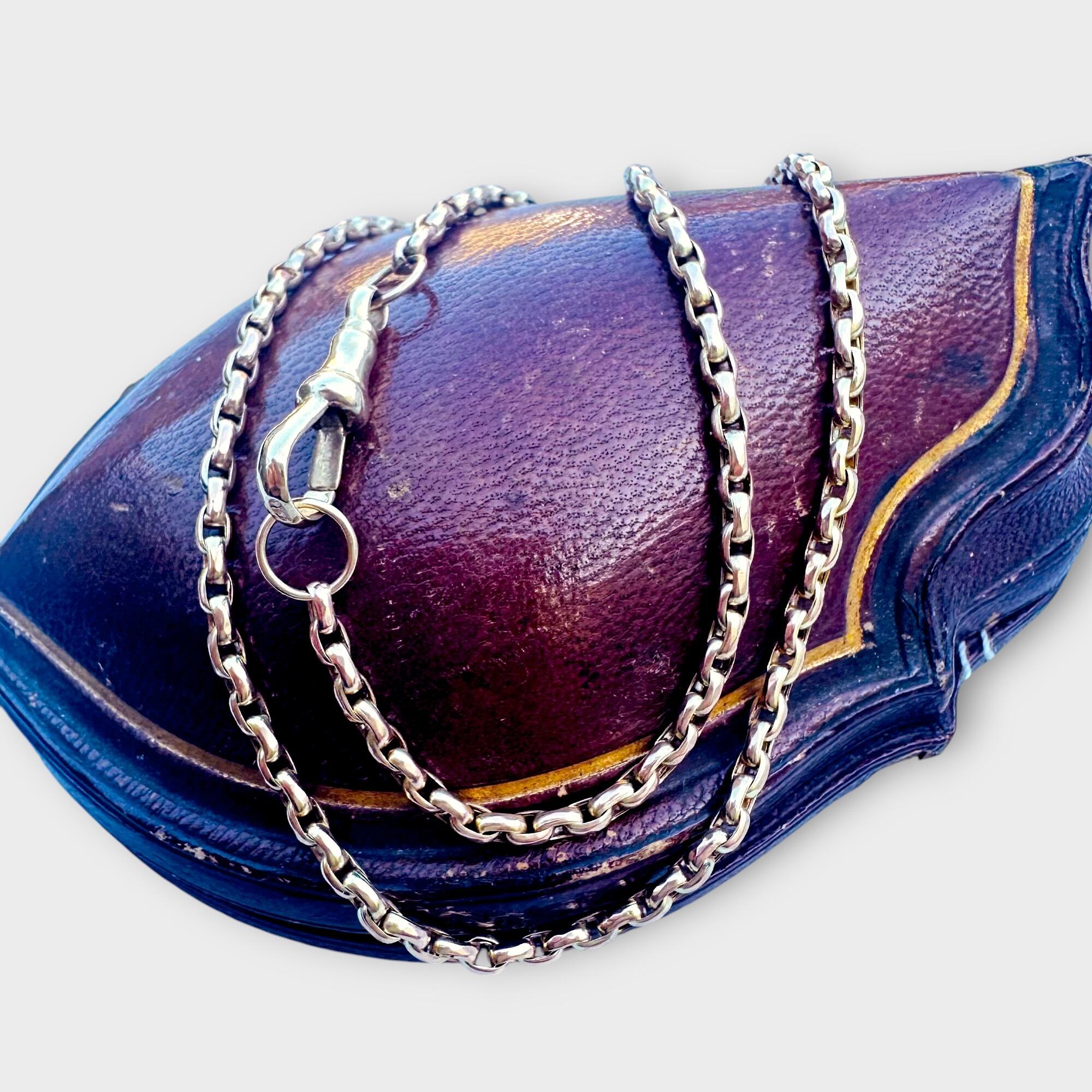 Victorian 9ct rose gold faceted belcher link chain with dog clip clasp on antique box.