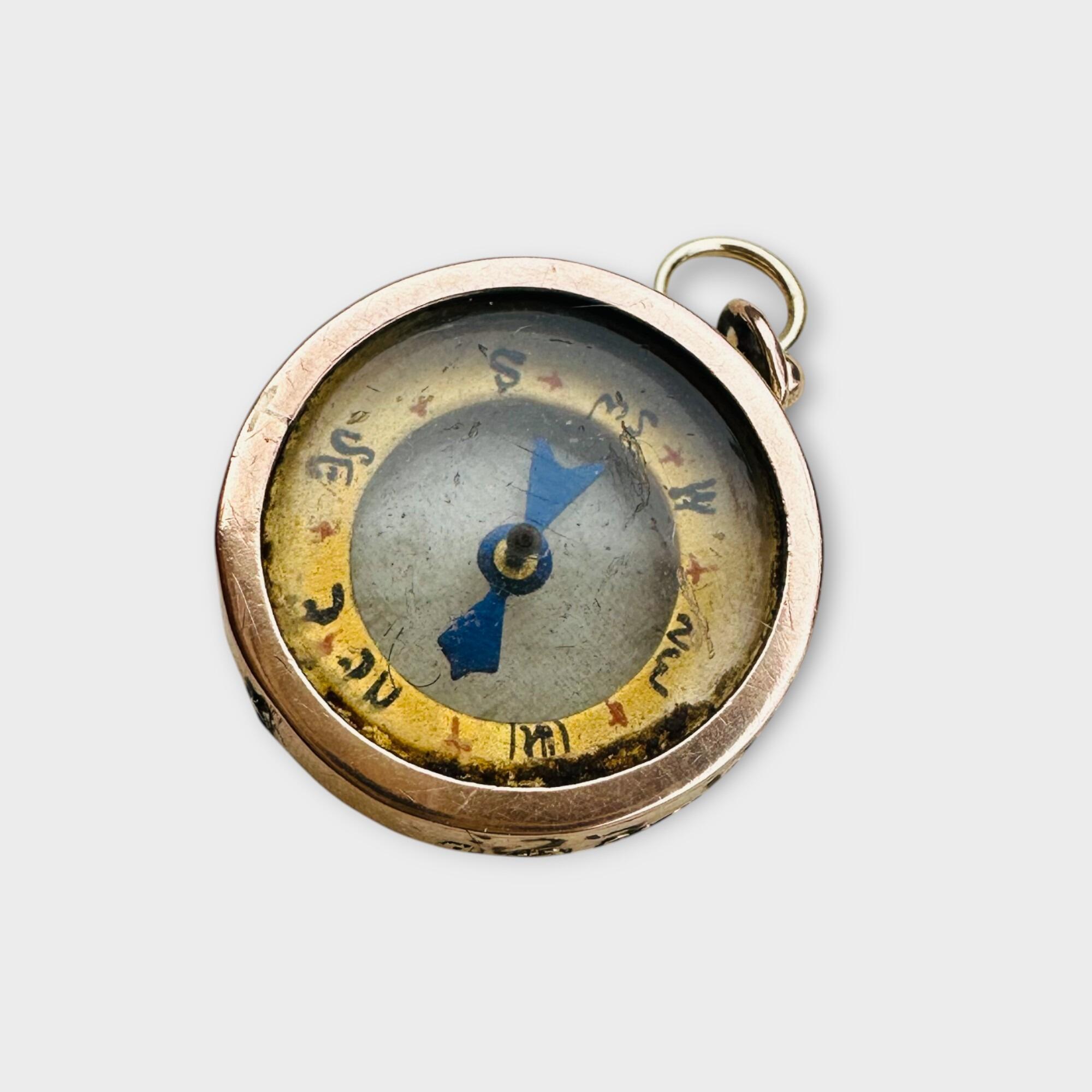 Front view of Edwardian 9k gold compass pendant charm