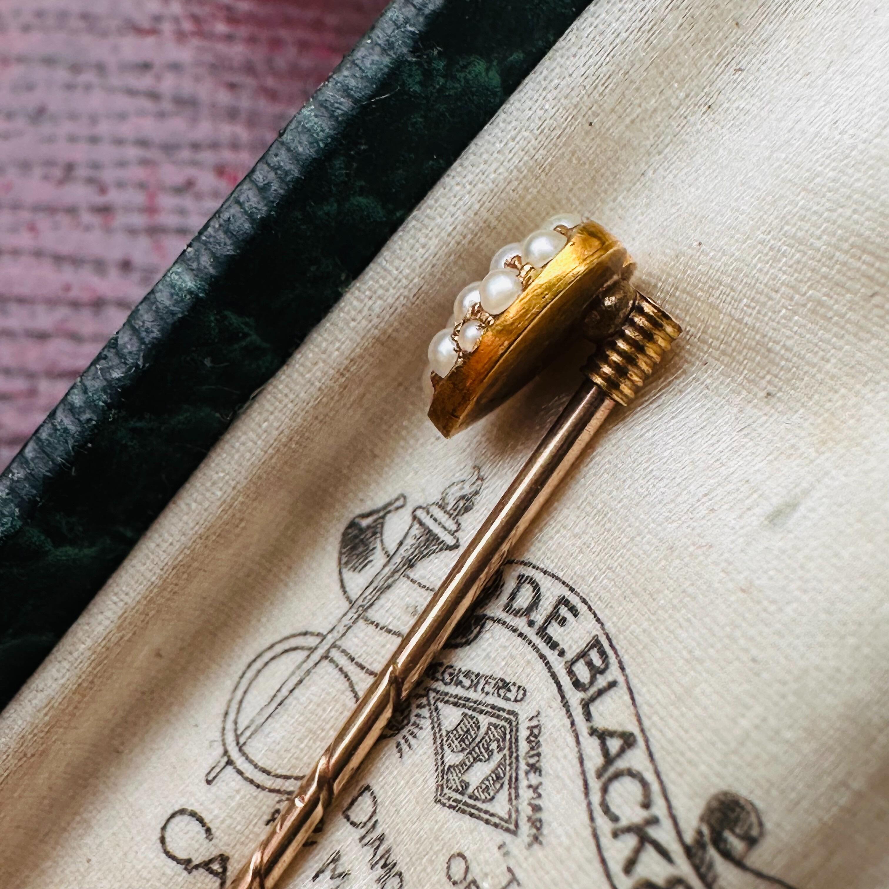15k Gold Heart-Shaped Pearl & Diamond Stick Pin displayed in antique box