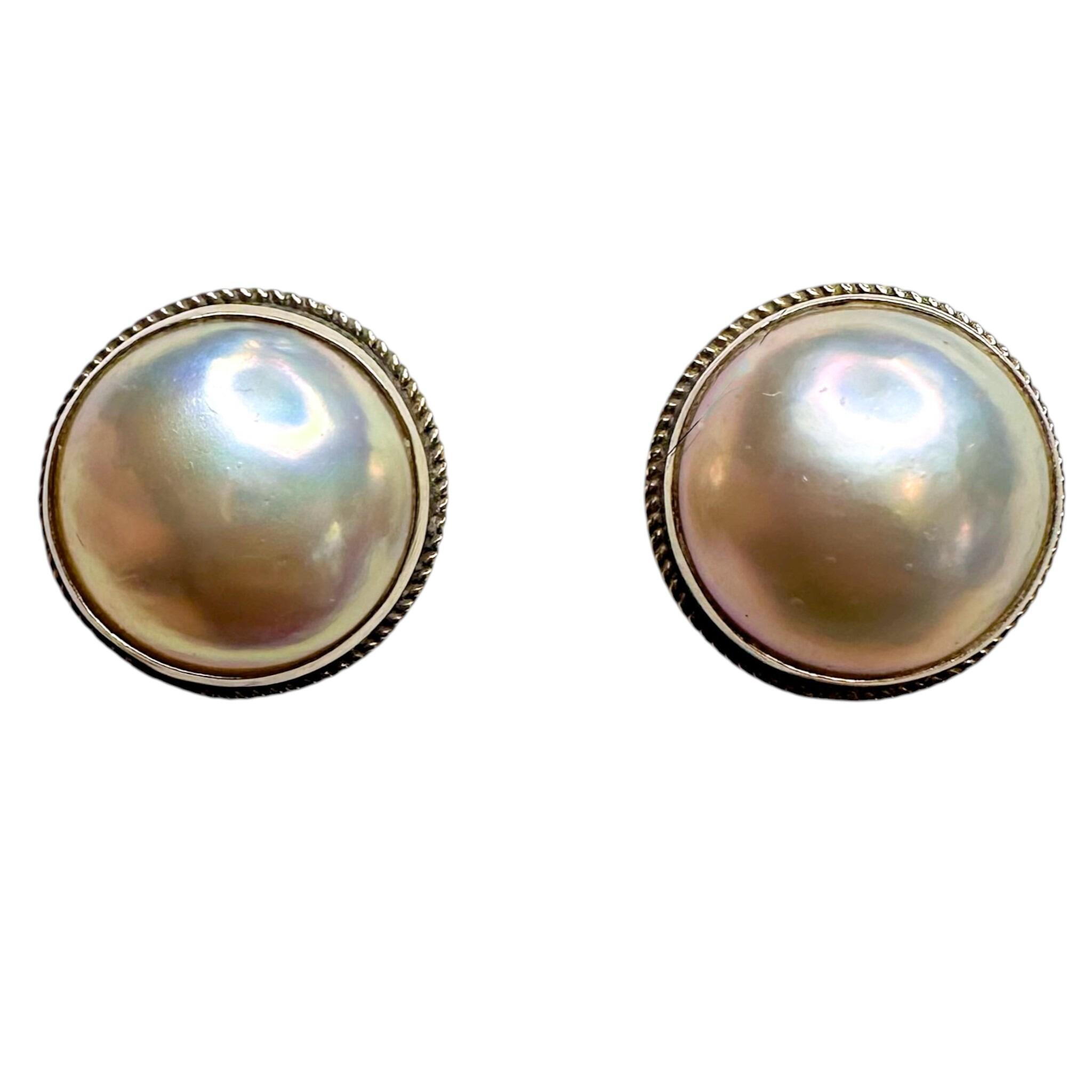 close up of Mabe Blister Pearl Rope Edge Earrings in 9k gold, with white background.