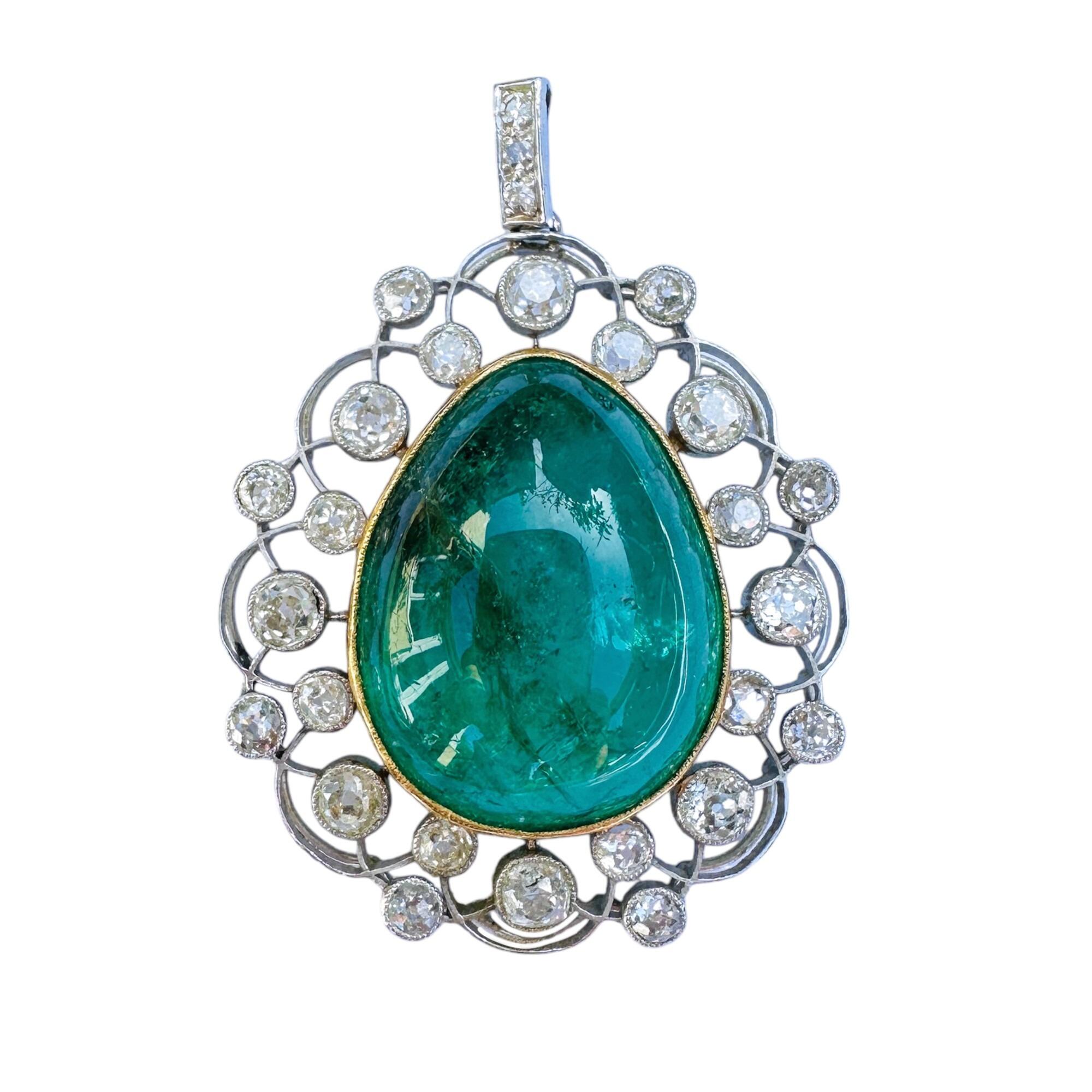 18k teardrop emerald pendant with a platinum trelliswork border on white background