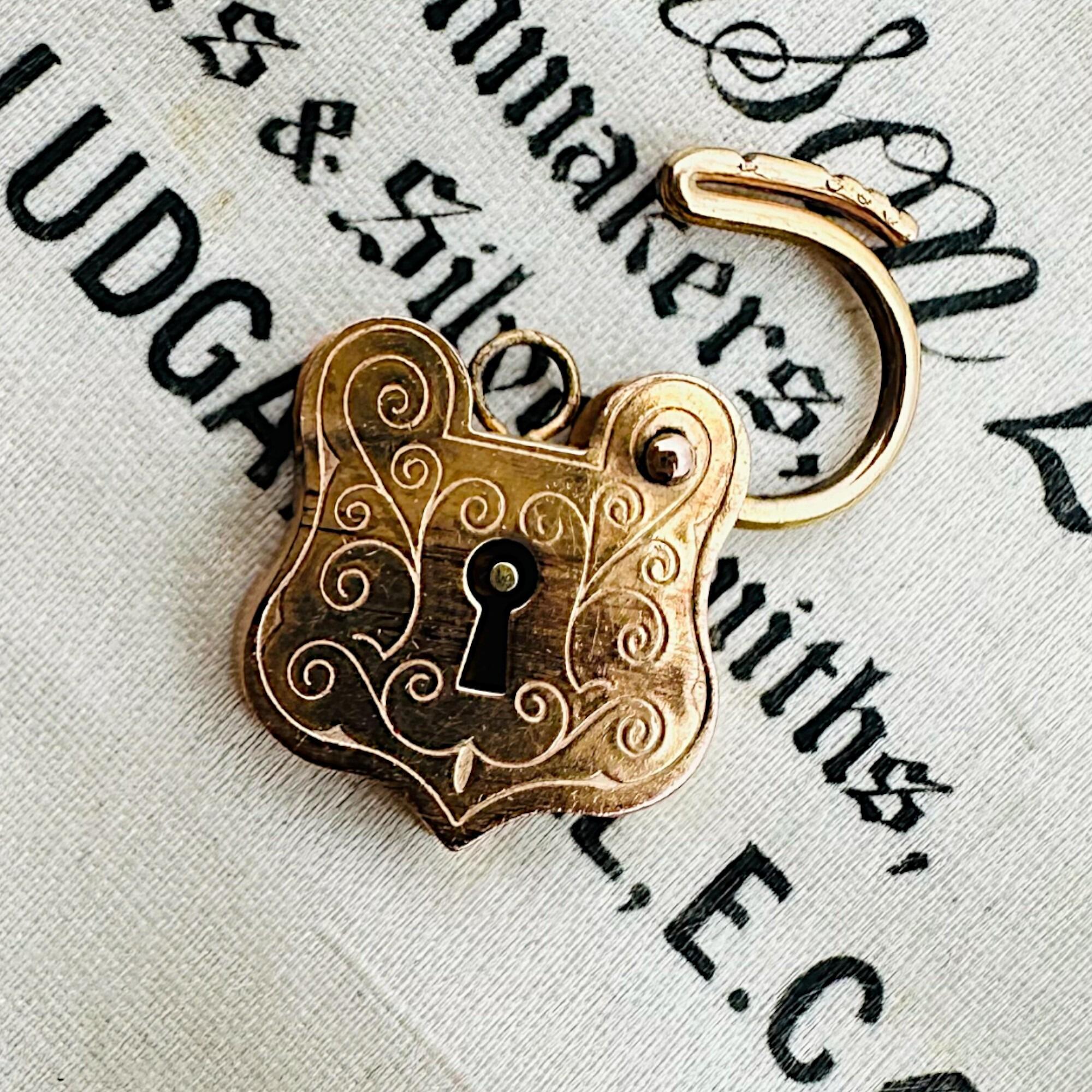 Rare, Romantic Antique 9k Rose Gold Shield Padlock Clasp displayed in antique box.
