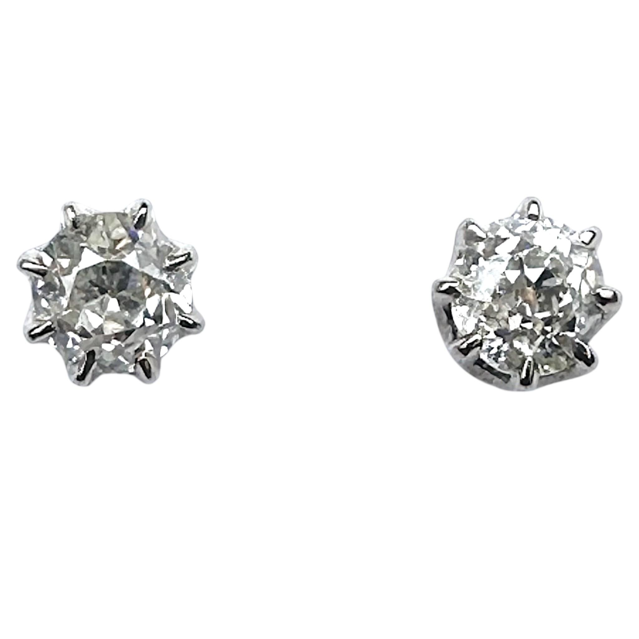 front view of Antique 18k Gold Old European Cut Diamond Stud Earrings with white background