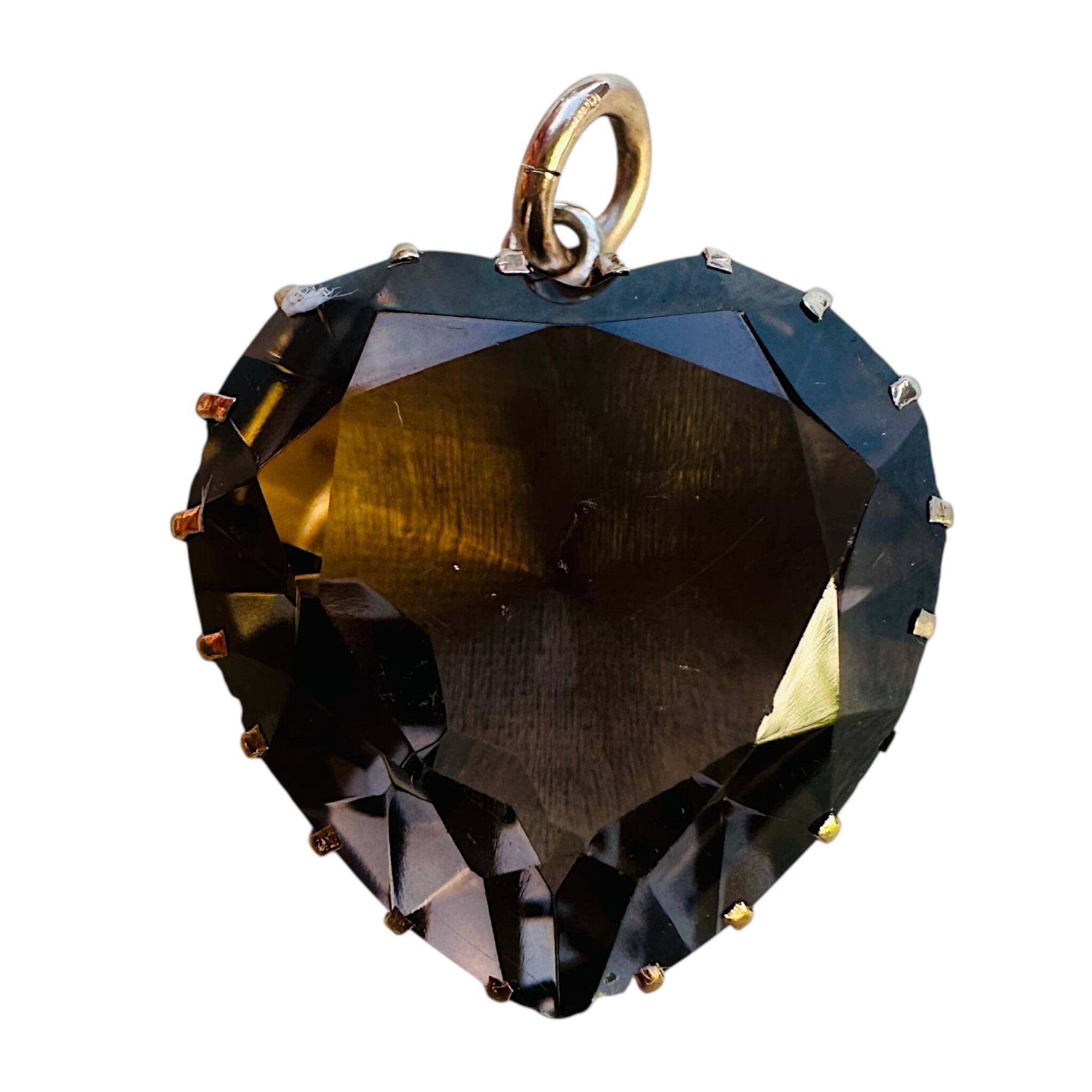 close up of  Antique Victorian Smoky Quartz Heart Pendant, with white background