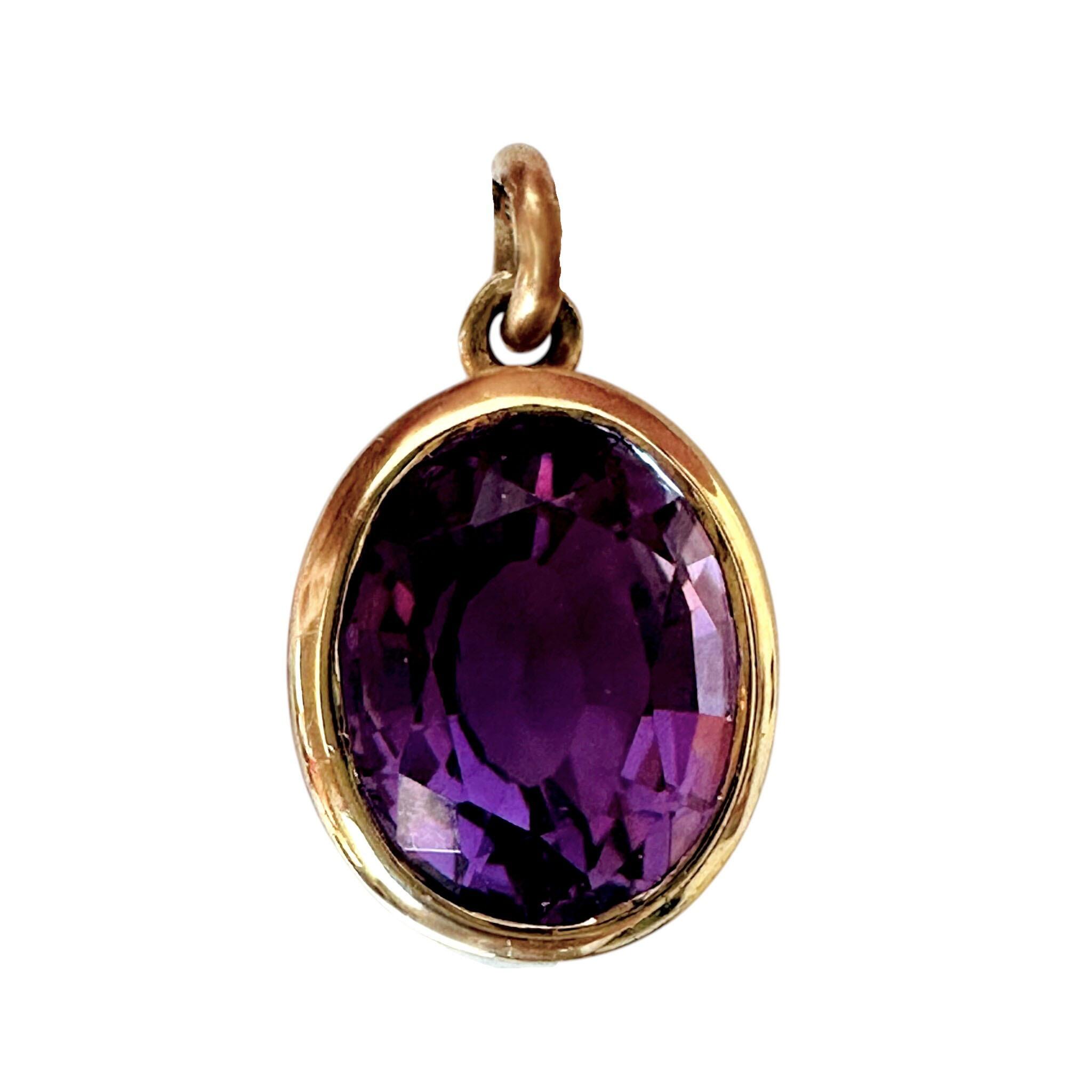 close up of 14k Yellow Gold & Amethyst Pendant, with white background