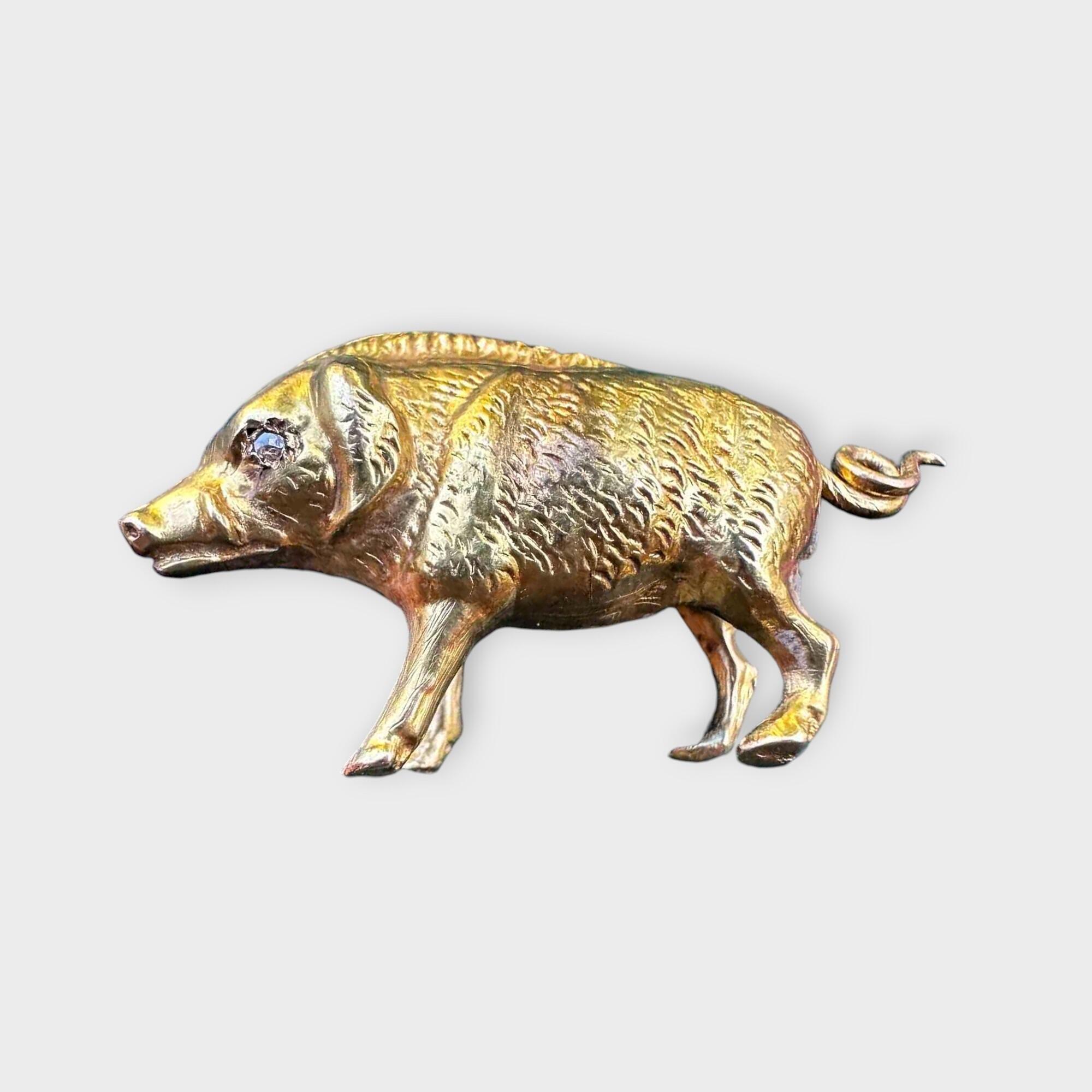 Victorian 15ct gold wild boar pendant / charm with diamond eyes, grey background