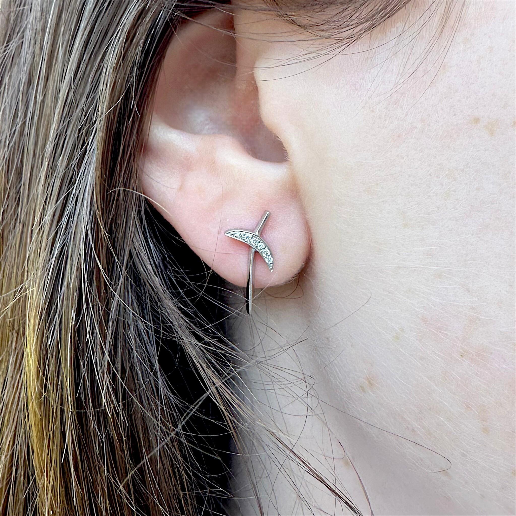 Platinum & Diamond Kiss Earrings worn on models ear
