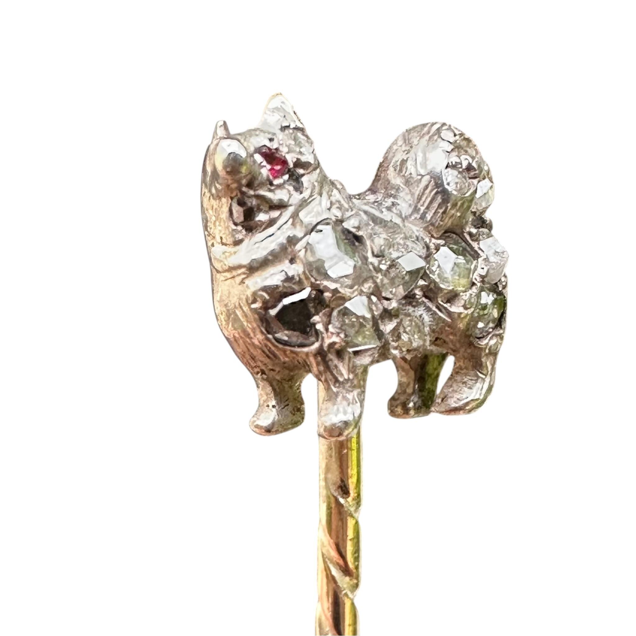 19th-century stick pin with Pomeranian dog motif and rose cut diamonds.