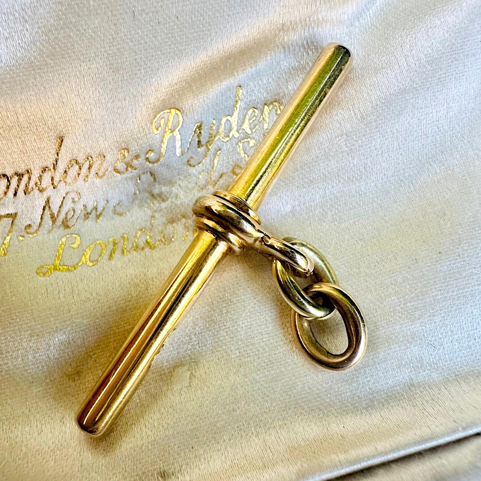 Antique 18k Victorian Yellow Gold T-Bar & Links displayed on antique box