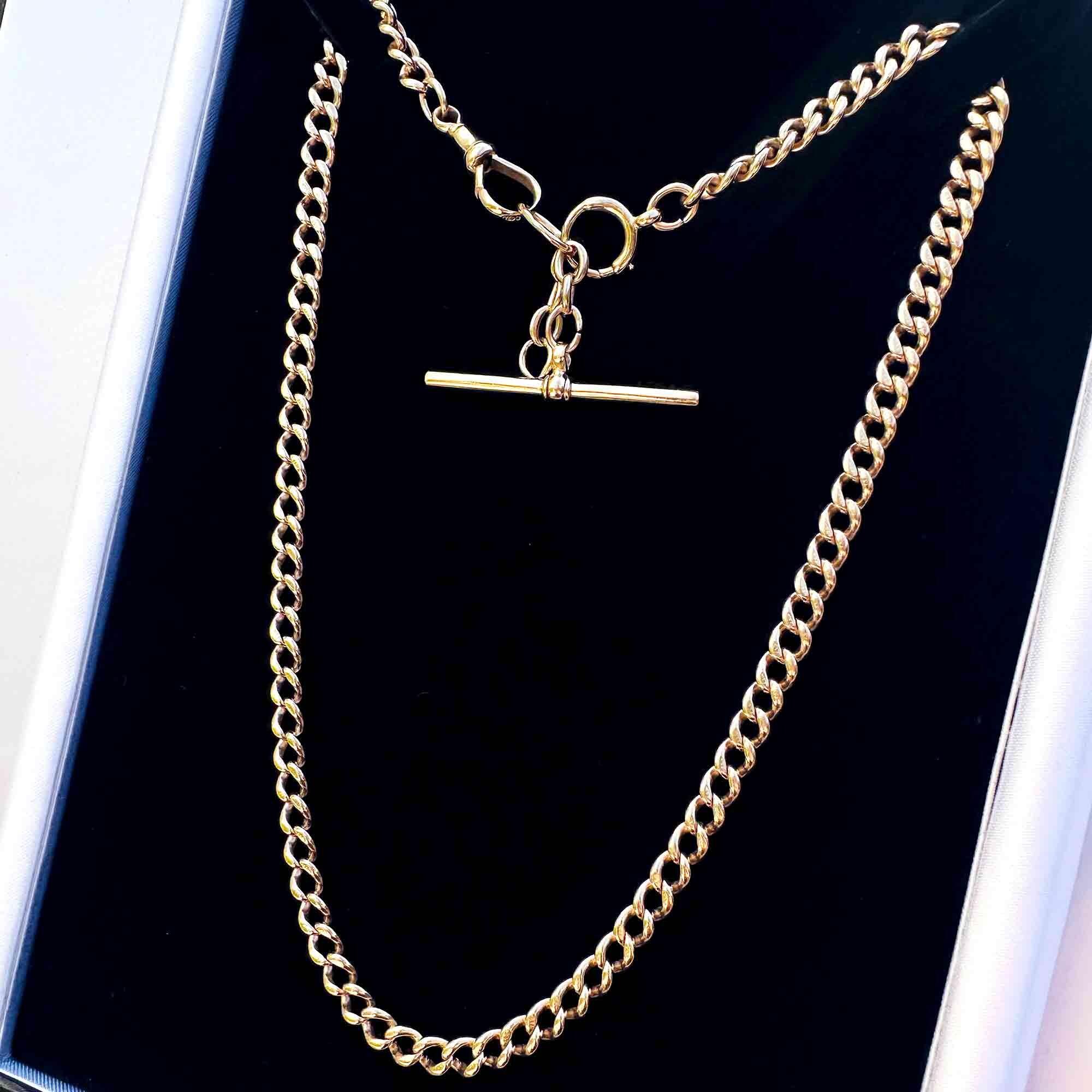 Edwardian 9ct Rose Gold Curb Link Chain with T-Bar & Dog Clip fittings on black velvet pad.