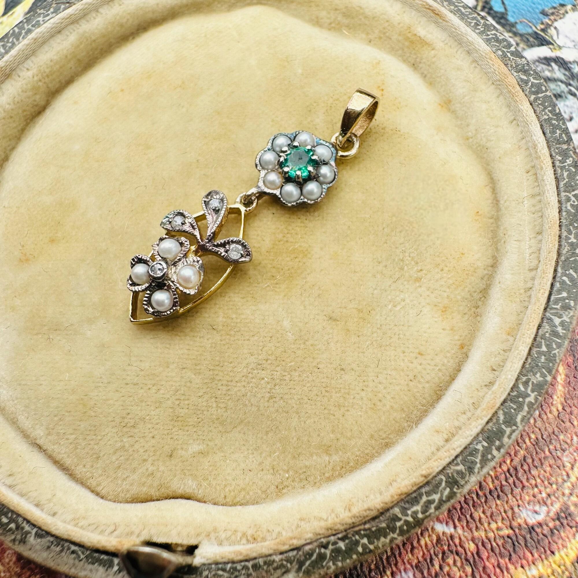 close up, Edwardian Style Emerald, Pearl & Diamond Pendant in Silver & 9k Gold displayed in antique box.