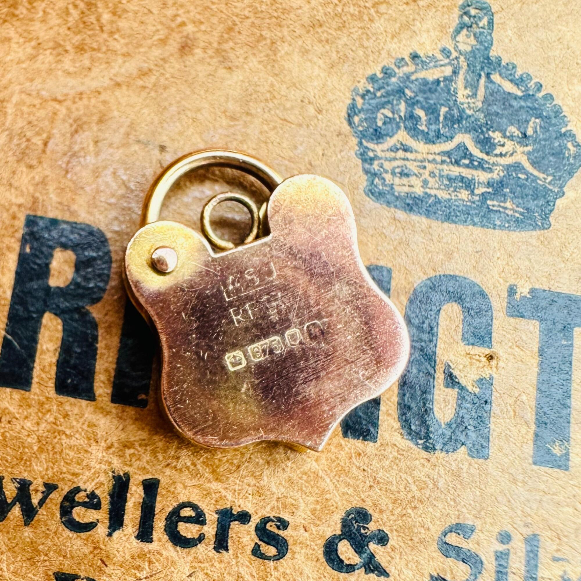 Rare, Romantic Antique 9k Rose Gold Shield Padlock Clasp displayed on antique box.