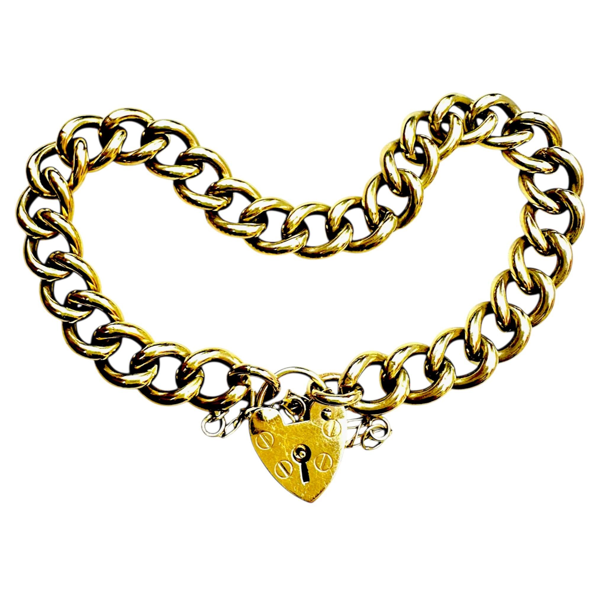 Heavy, Chunky Gold Curb Bracelet & Heart Padlock with White backround