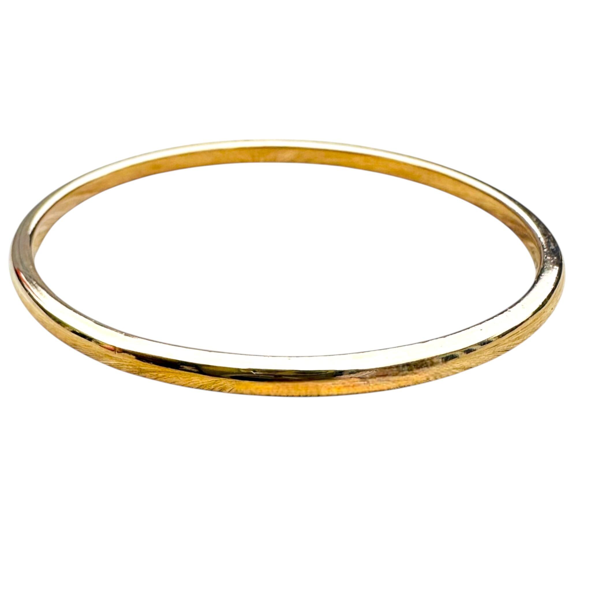 side profile of Vintage Solid Gold Bangle with white background