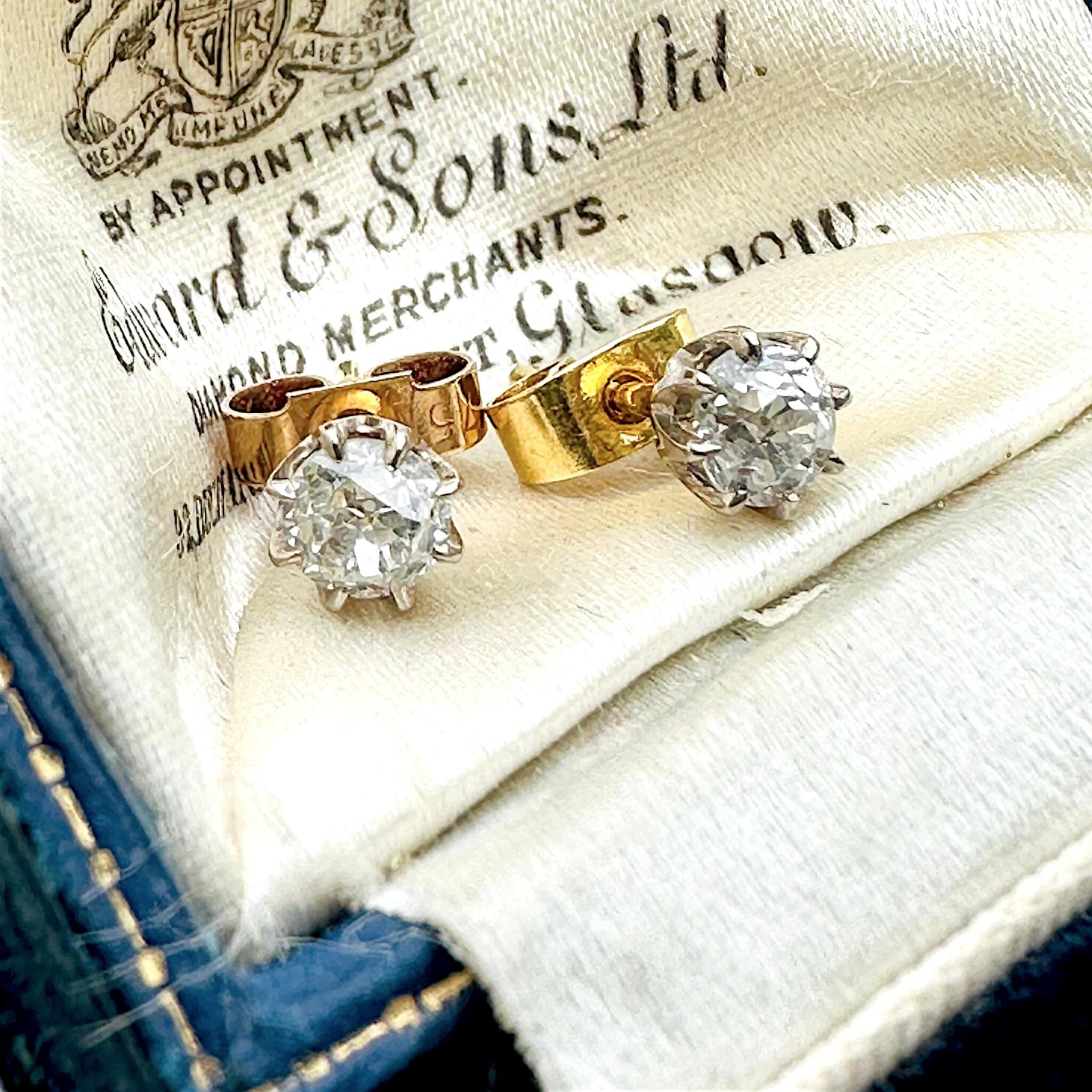 Antique 18k Gold Old European Cut Diamond Stud Earrings displayed on antique box