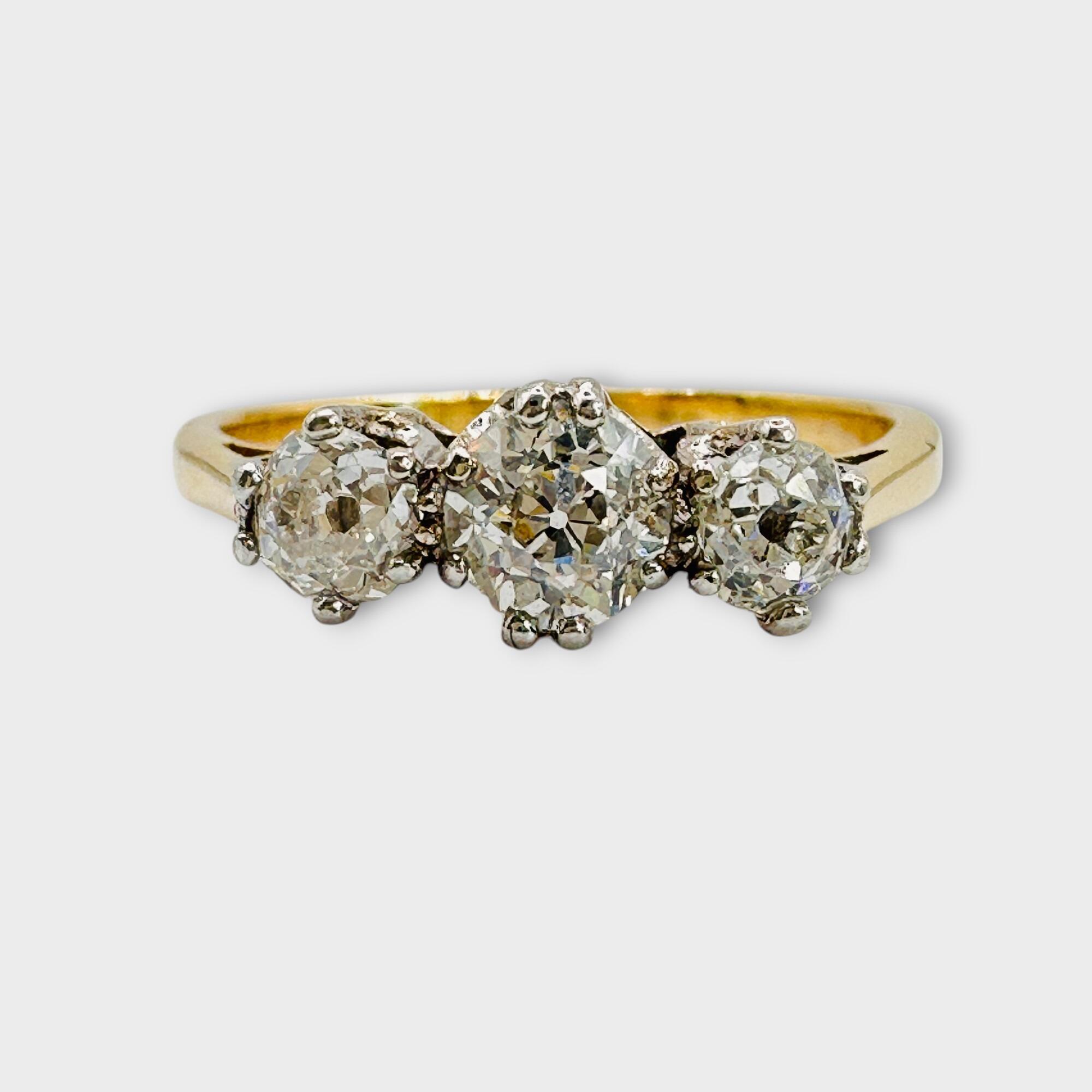 Edwardian 18ct Gold & Platinum Diamond 0.55ct Trilogy Engagement Ring, Circa 1910 facing forward on grey background