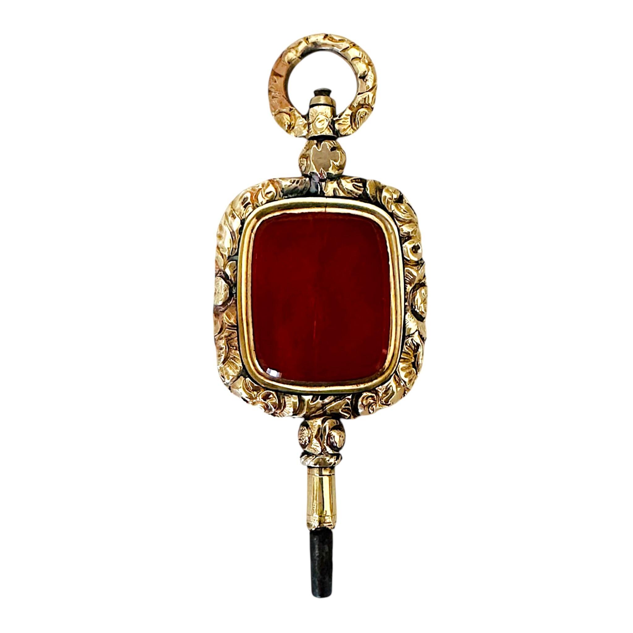 front view of Antique Georgian Carnelian Watch Key Pendant, with white background