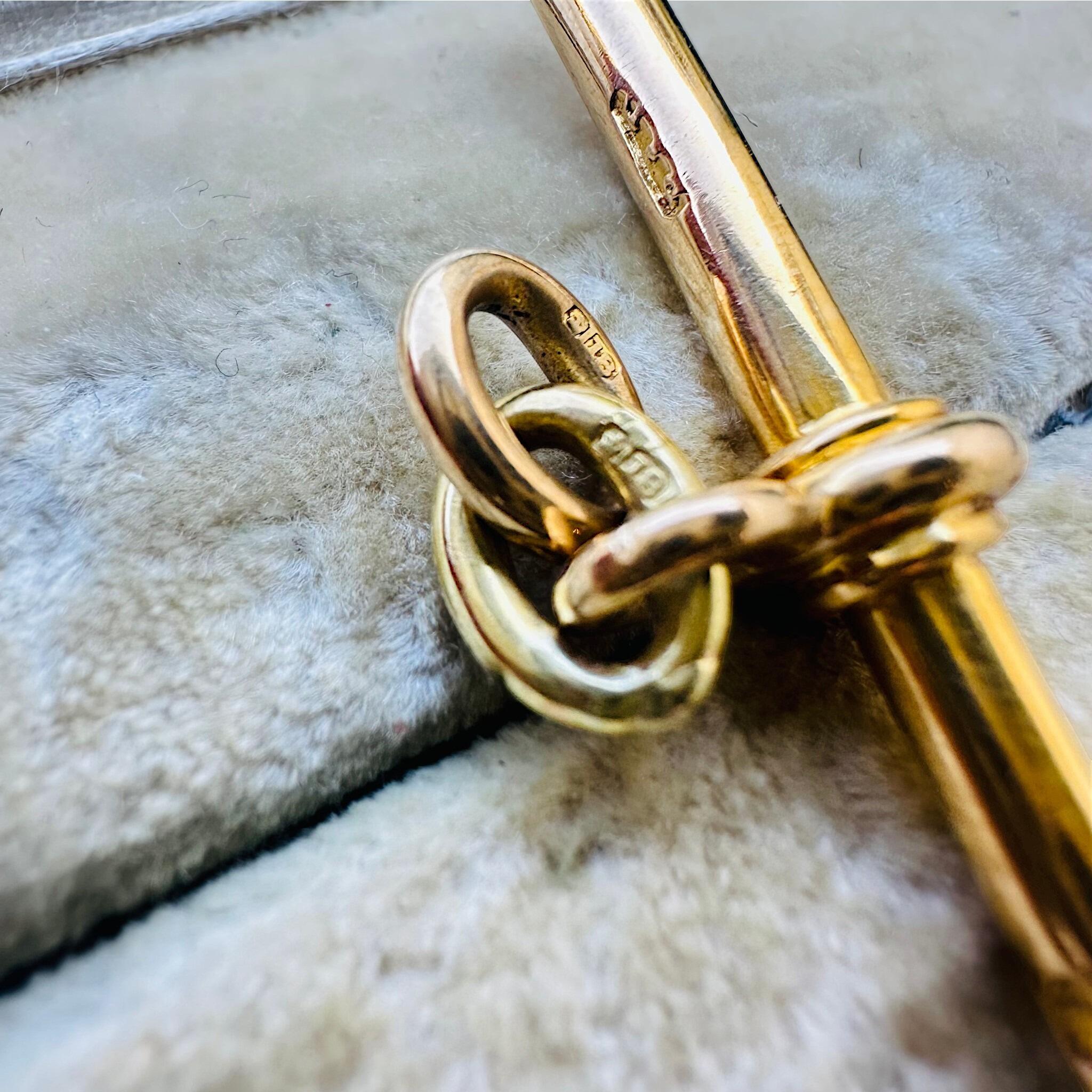 close up of Antique 18k Victorian Yellow Gold T-Bar & Links on  antique box