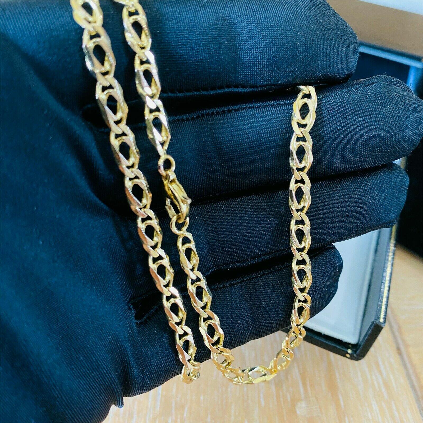 9ct yellow gold double curb link chain with lobster clasp. Width 5mm, total length 23", weight 18.3g. Hallmarked 375. Modern design.