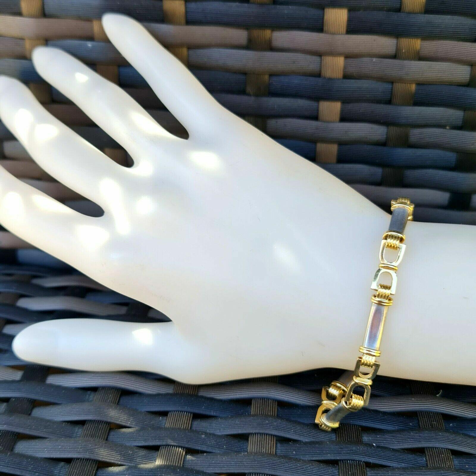 Elegant equestrian-themed bracelet with yellow and white gold links, 18ct gold, 7.5 inches, 20.1 grams, perfect for stylish wrist-stacks.