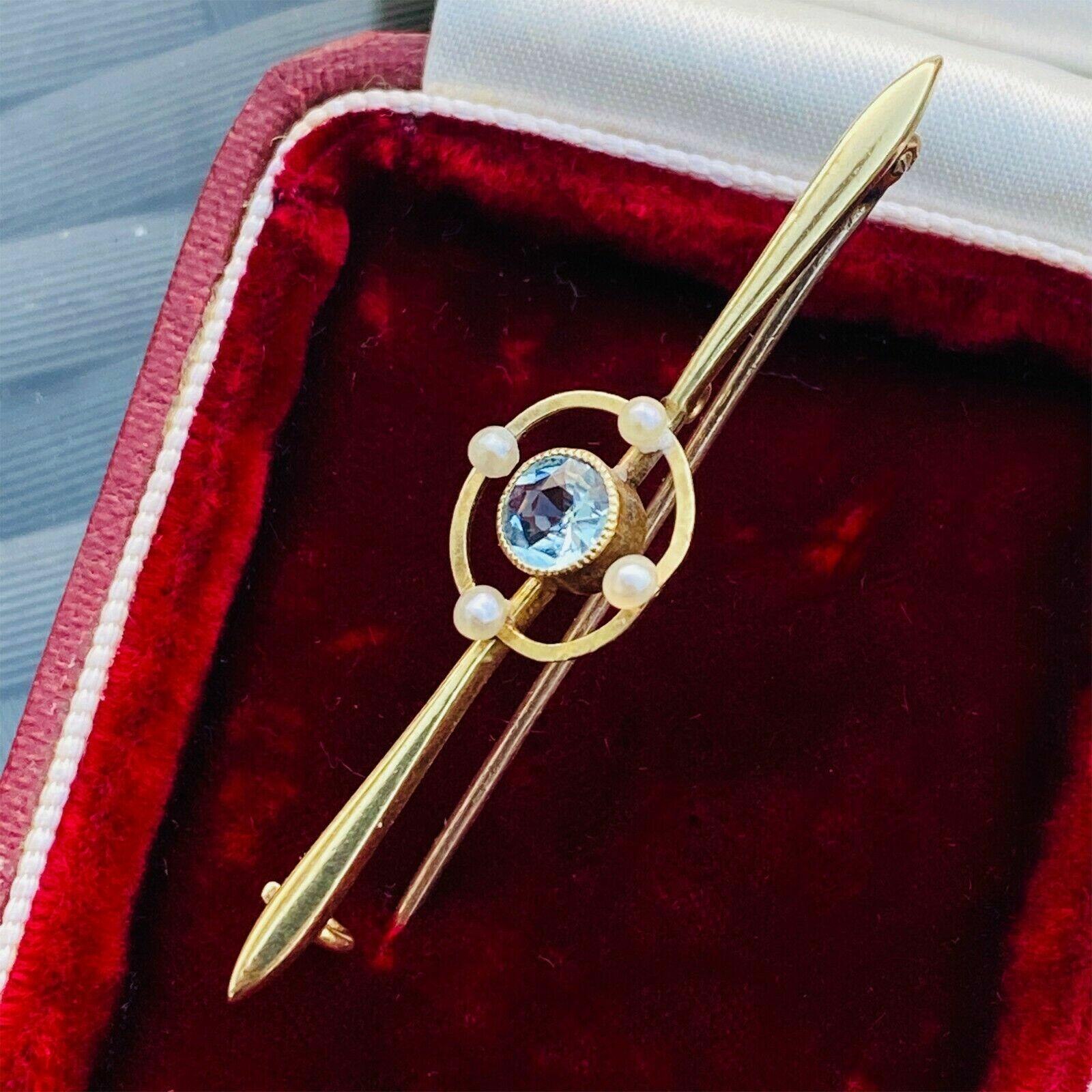 Edwardian 15carat gold bar brooch with Aquamarine gemstone and seed pearls, inspired by Art Deco and aviation design.