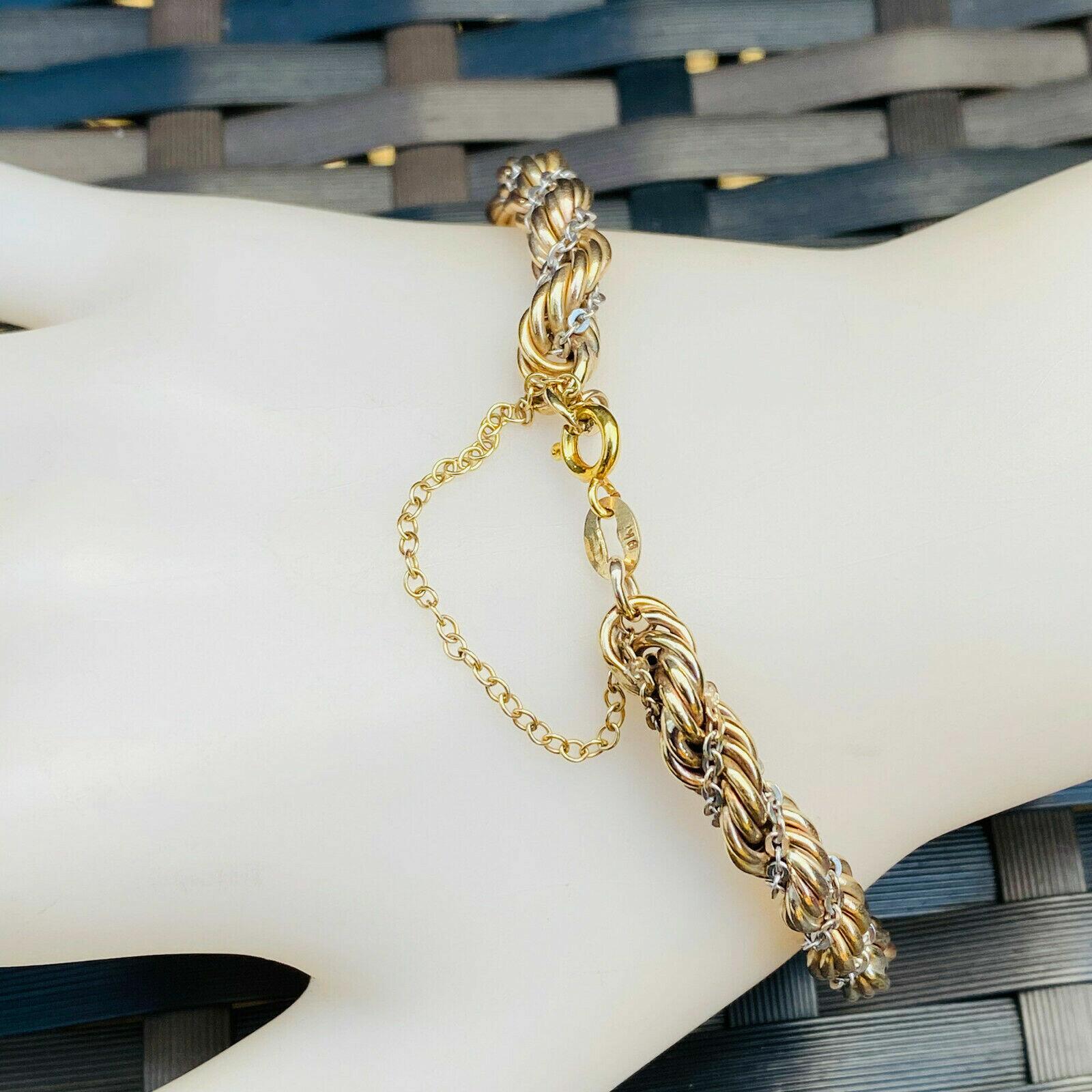 Stylish 9ct gold rope bracelet with white gold rolo link chain, 6.2mm wide. Bolt and jump ring fitting, safety chain included.