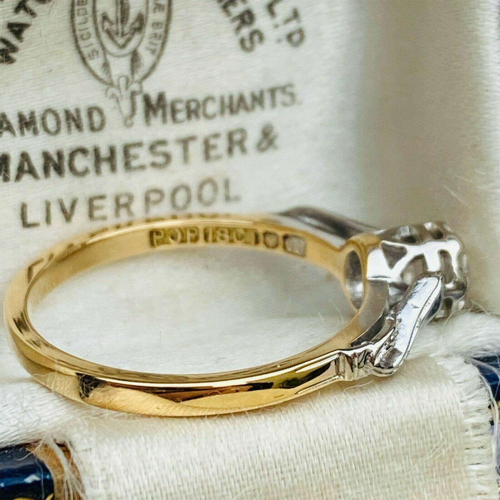 Elegant solitaire diamond ring with illusion setting in 18ct white gold, tapering to yellow gold shank. Bright gemstone, size N/7, 2.9g, modern design.