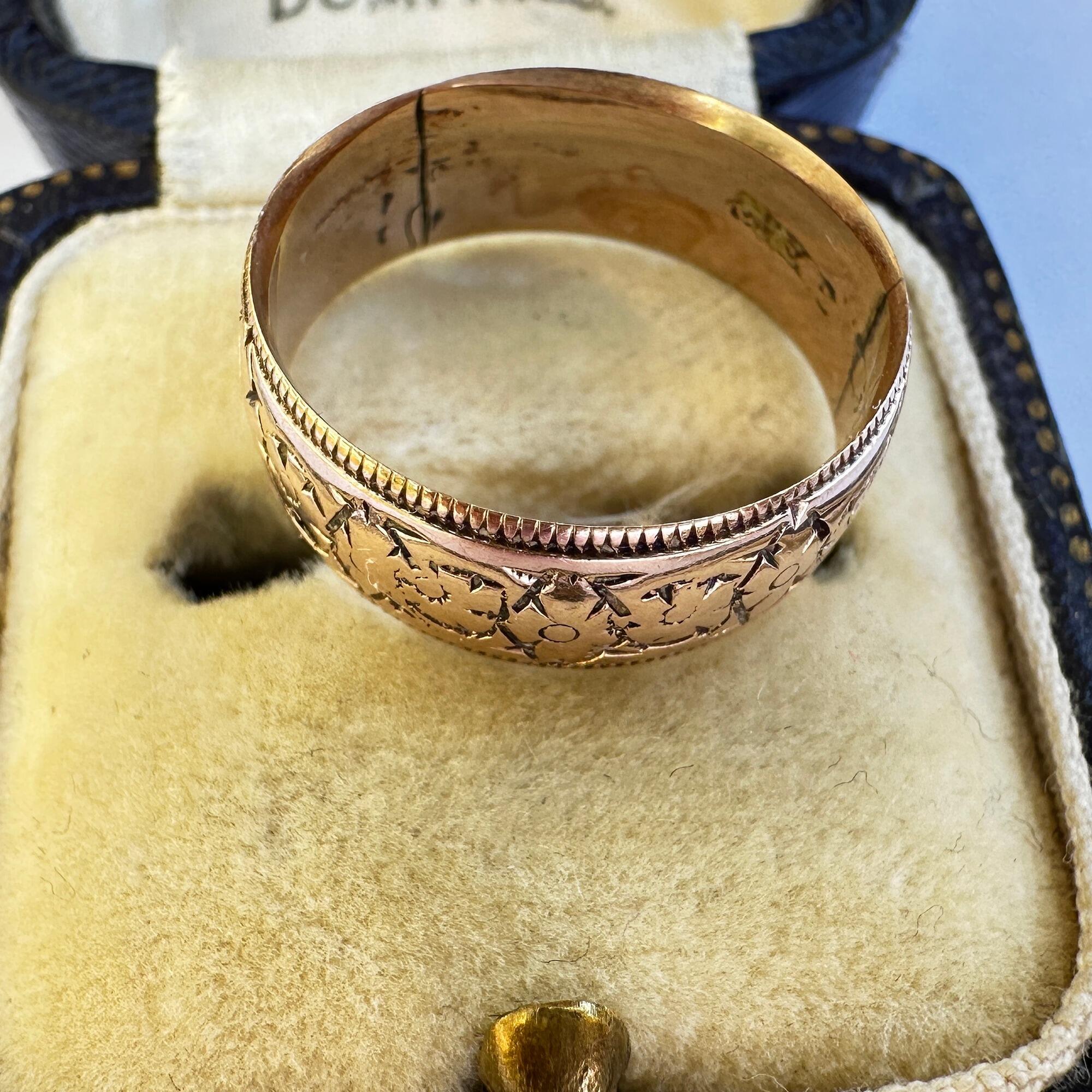 Antique 9ct rose gold wedding band with orange blossoms and milgrain edging