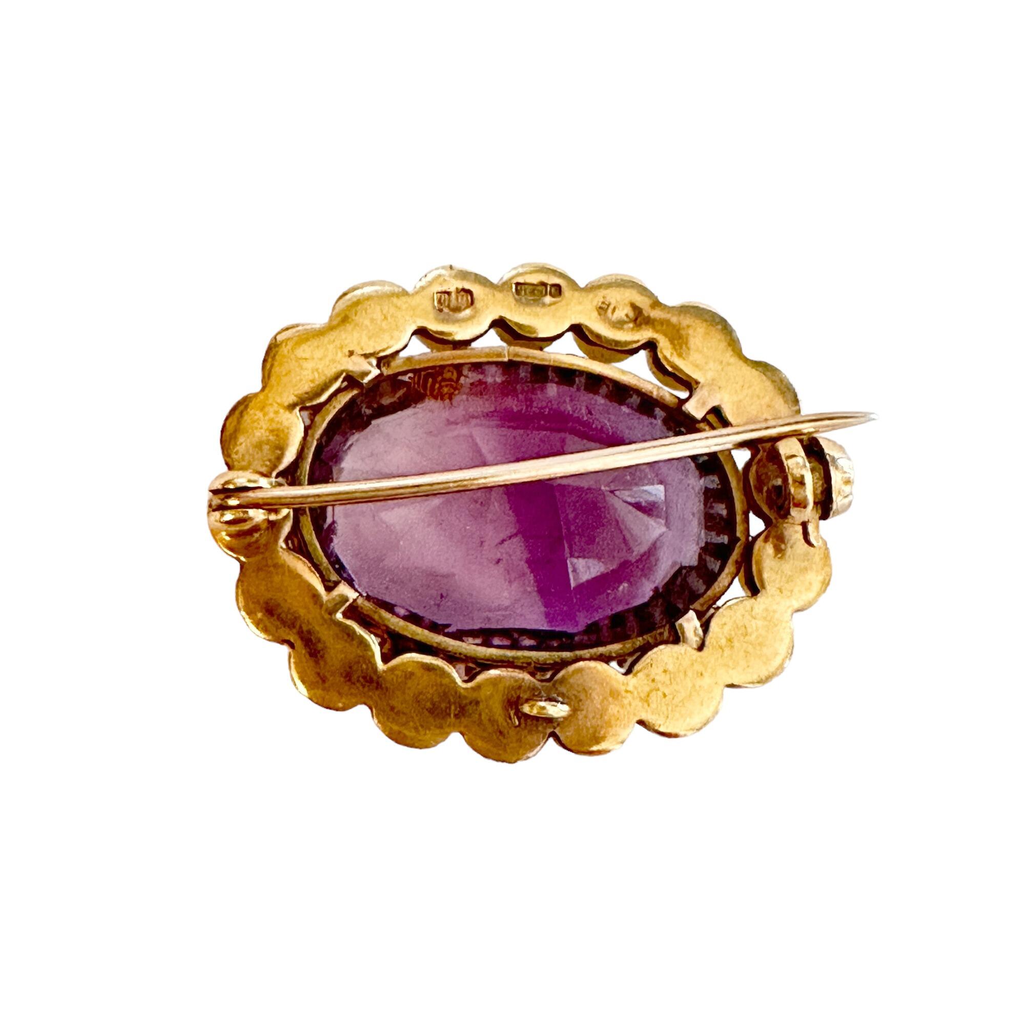 Victorian 9ct gold brooch with large amethyst gemstone and pearls, T-bar and C-clasp fitting, hallmarked 9ct, 17ct amethyst, 29.5 x 24mm.