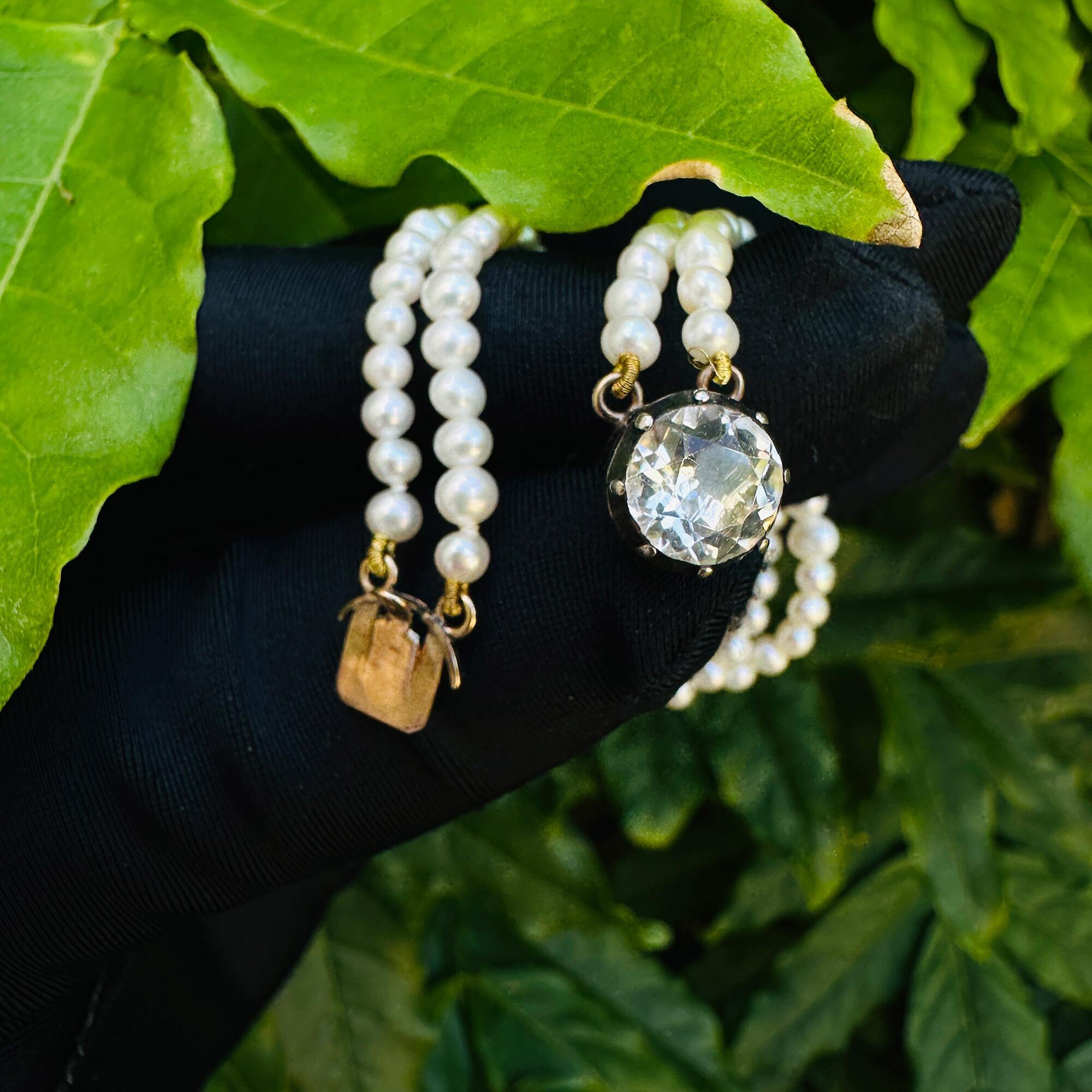 Elegant pearl bracelet with Georgian clasp, 3.5mm white pearls, and 8mm paste stone. Petite 6" length, unmarked 9ct gold.