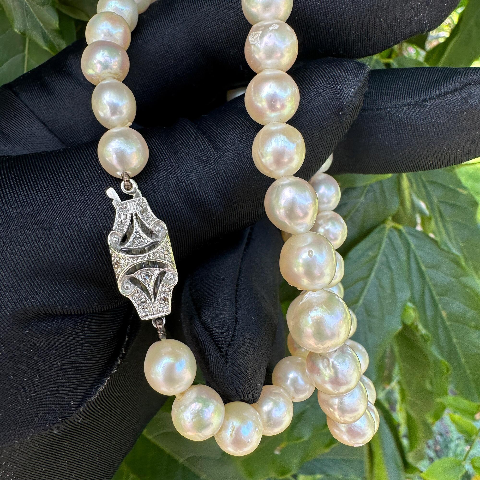 Classic cultured pearl necklace with baroque pearls, diamond clasp, perfect for weddings or anniversaries, Art Deco style.