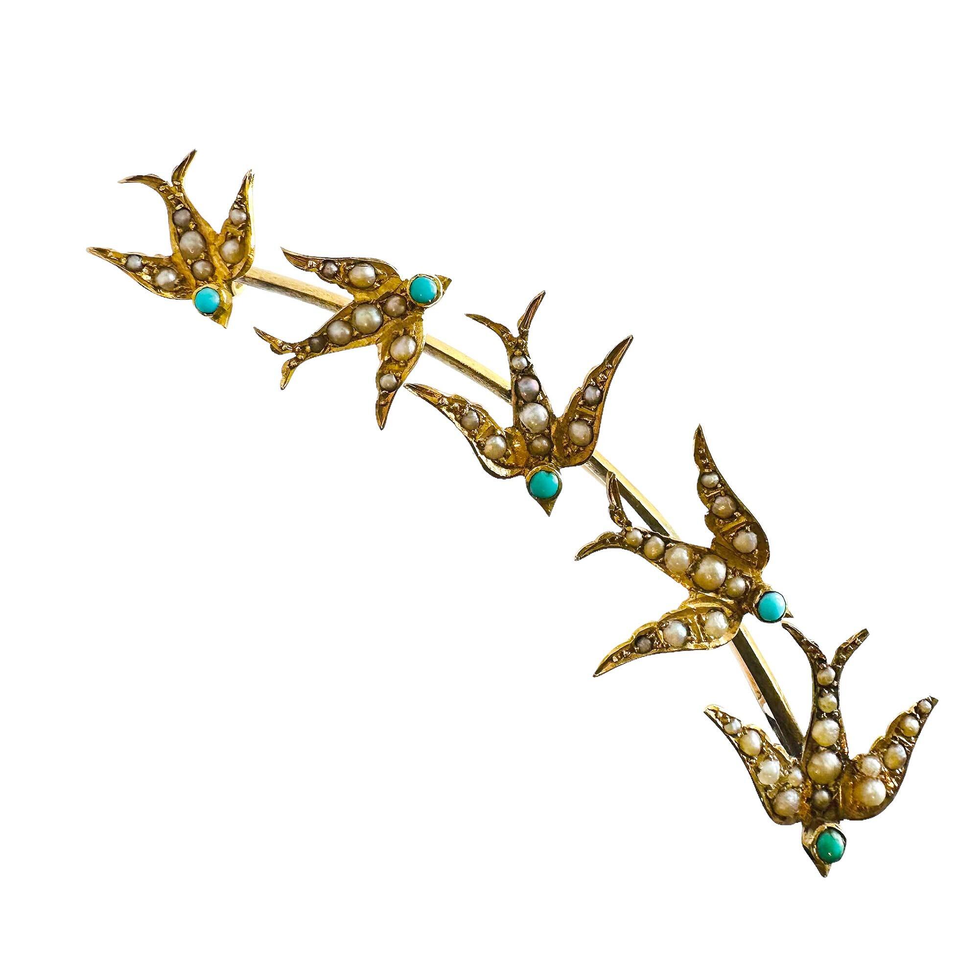 Edwardian gold brooch with five swallows, set with seed pearls and turquoise, symbolizing love and safe return