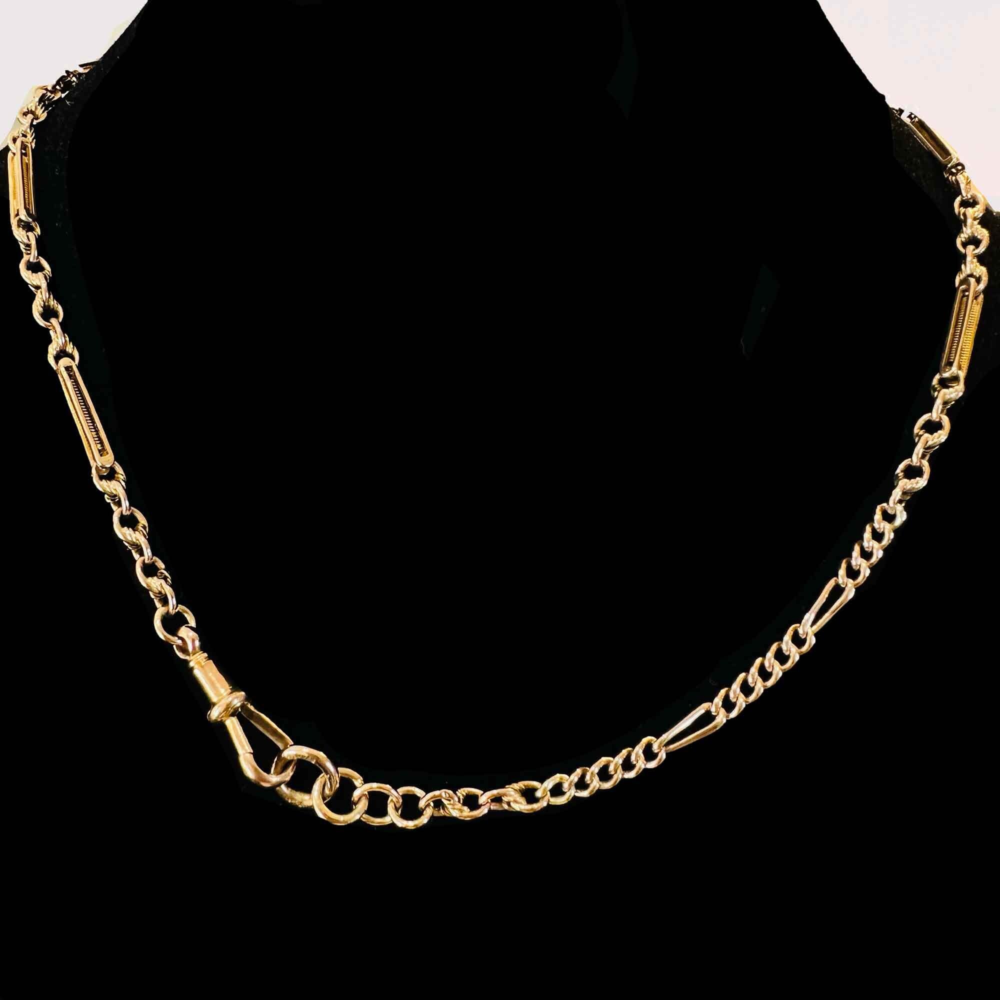 Antique chain with unique links, rope-like detail, and dog-clip fitting. Can be worn alone or layered for a stunning look.
